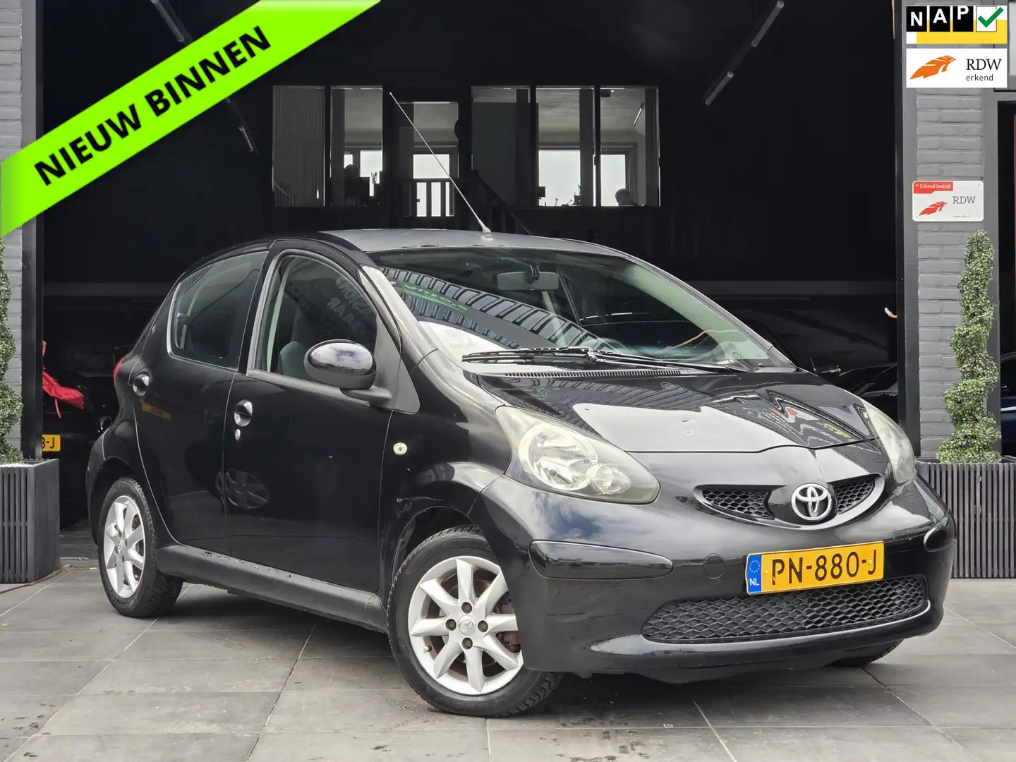 Toyota Aygo 1.0-12V|Airco|Elek.Ramen|Navi|Trekhaak|AUX Zwart - 1