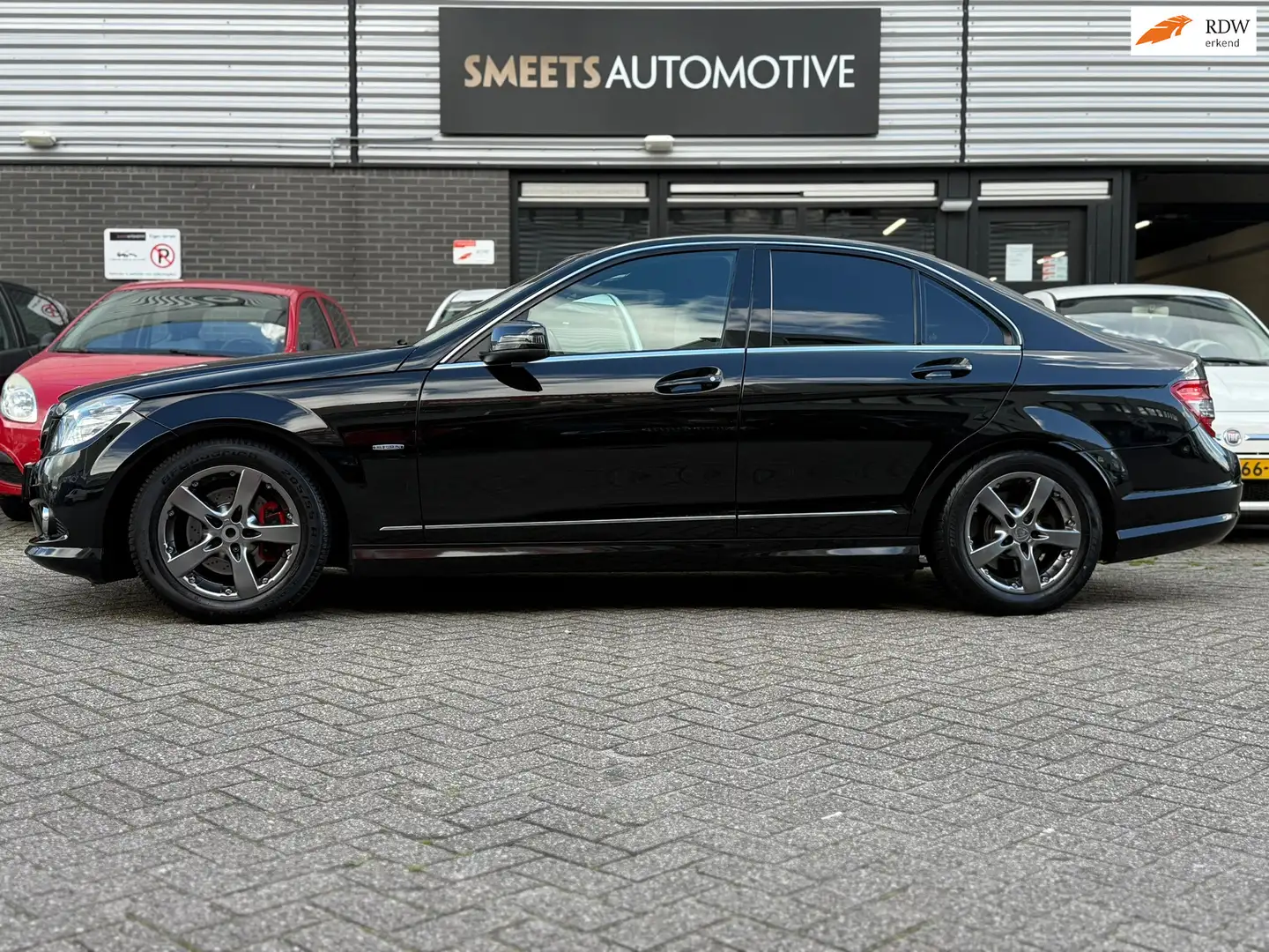 Mercedes-Benz C 180 K BlueEFFICIENCY,Automaat,Met APK afgeleverd Zwart - 1