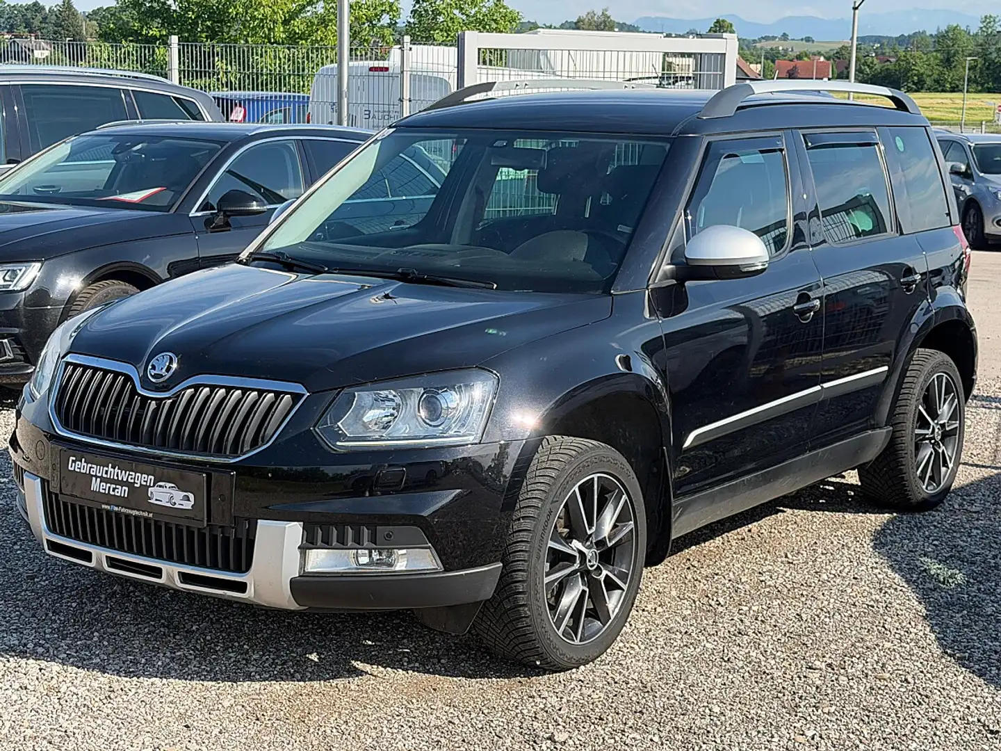 Skoda Yeti Outdoor Elegance 2,0 TDI 4x4 DSG Schwarz - 1