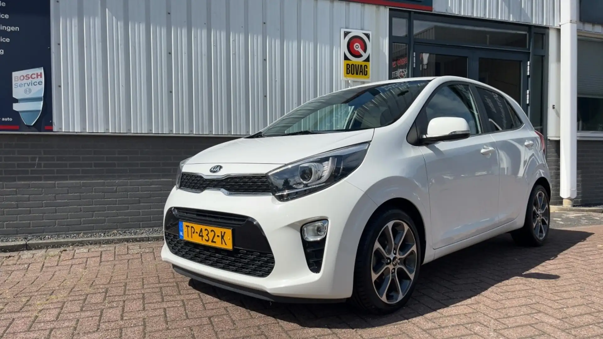 Kia Picanto 1.0 CVVT Design Navi Cruise Wit - 1