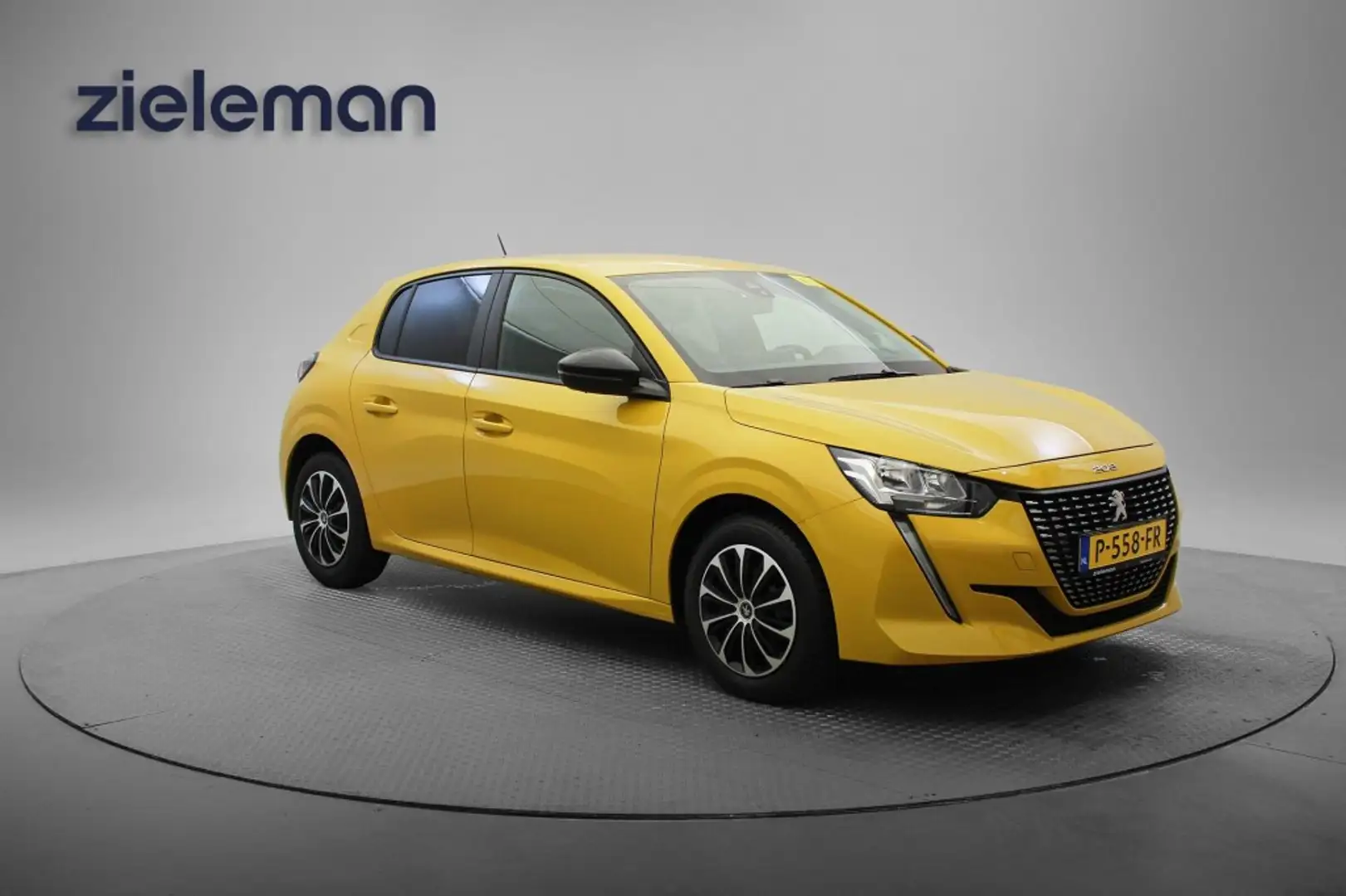 Peugeot 208 1.2 PureTech Active - Carplay, Navi, Cruise Geel - 1