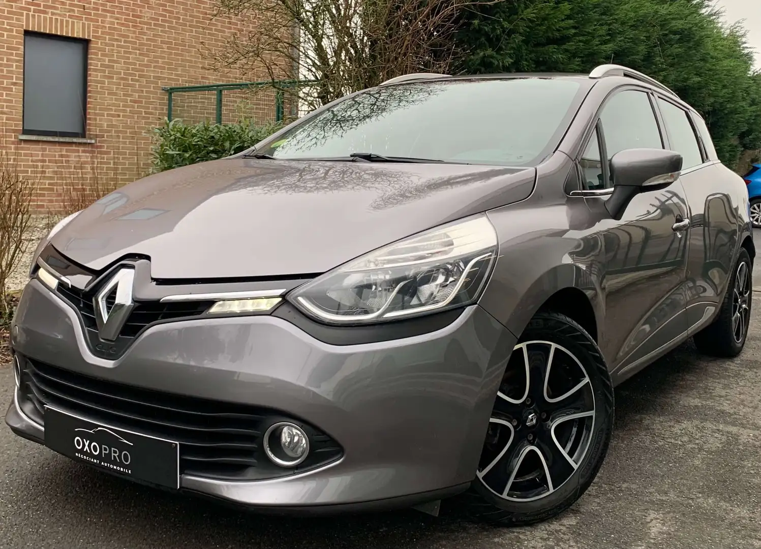 Renault Clio 1.5 DCI / Airco / Gps / Bluetooth / Cruise / Gris - 1