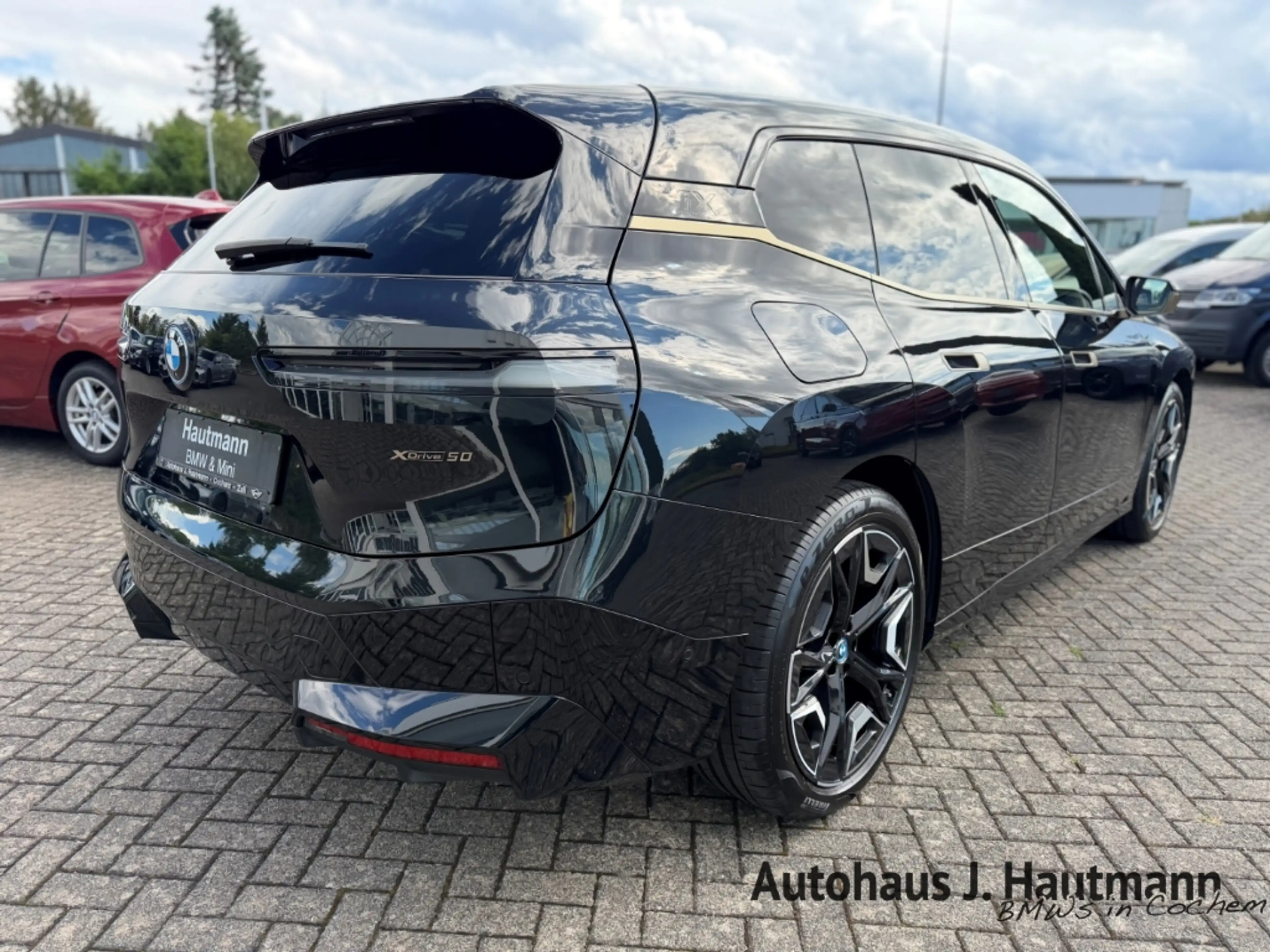 BMW iX xDrive 50 +NP:136.580€+AHK+LUFTF.+PANO+B&W+ — photo 7