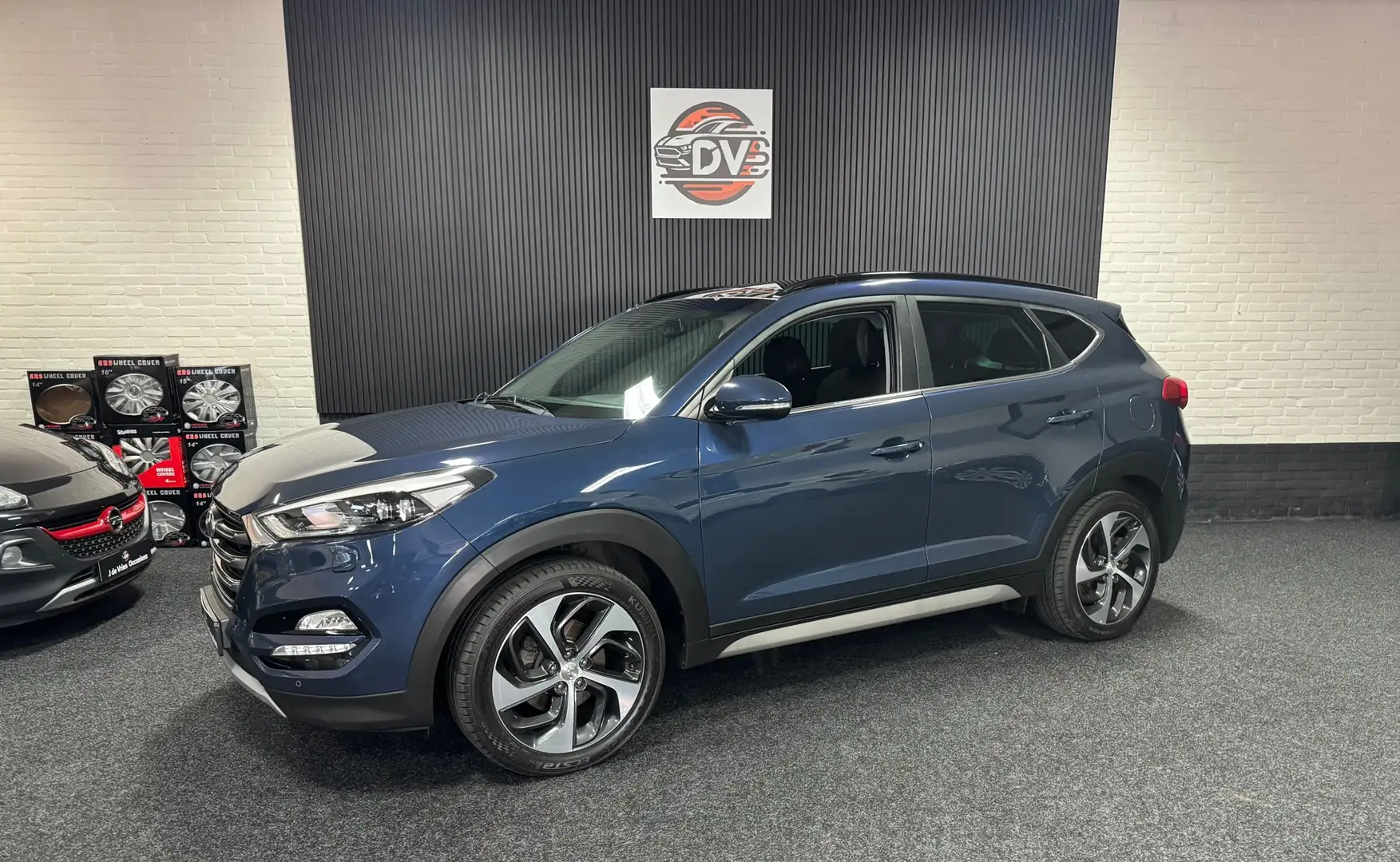 Hyundai TUCSON 1.6 T-GDi Premium 4WD, LED, PANO DAK, CRUISE, STL Blauw - 1