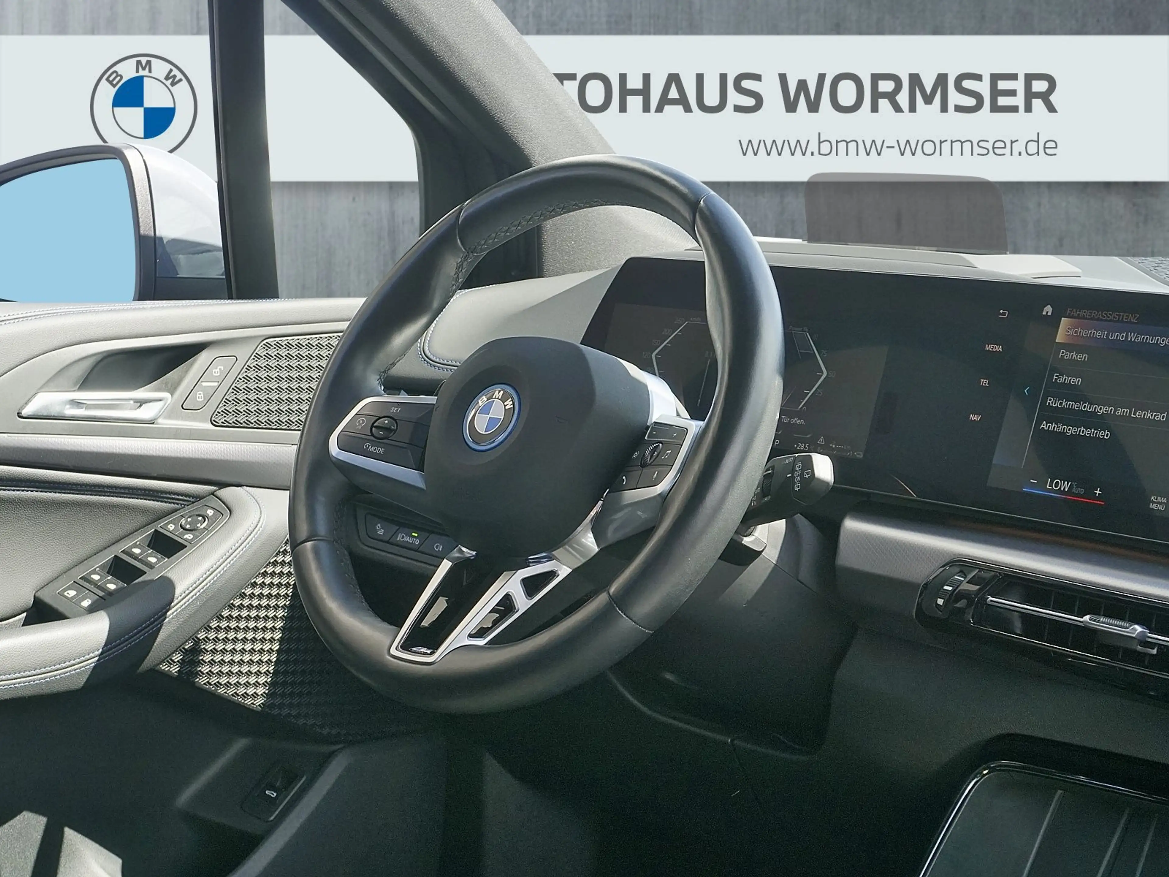 BMW 225 e xDrive Active Tourer — photo 11