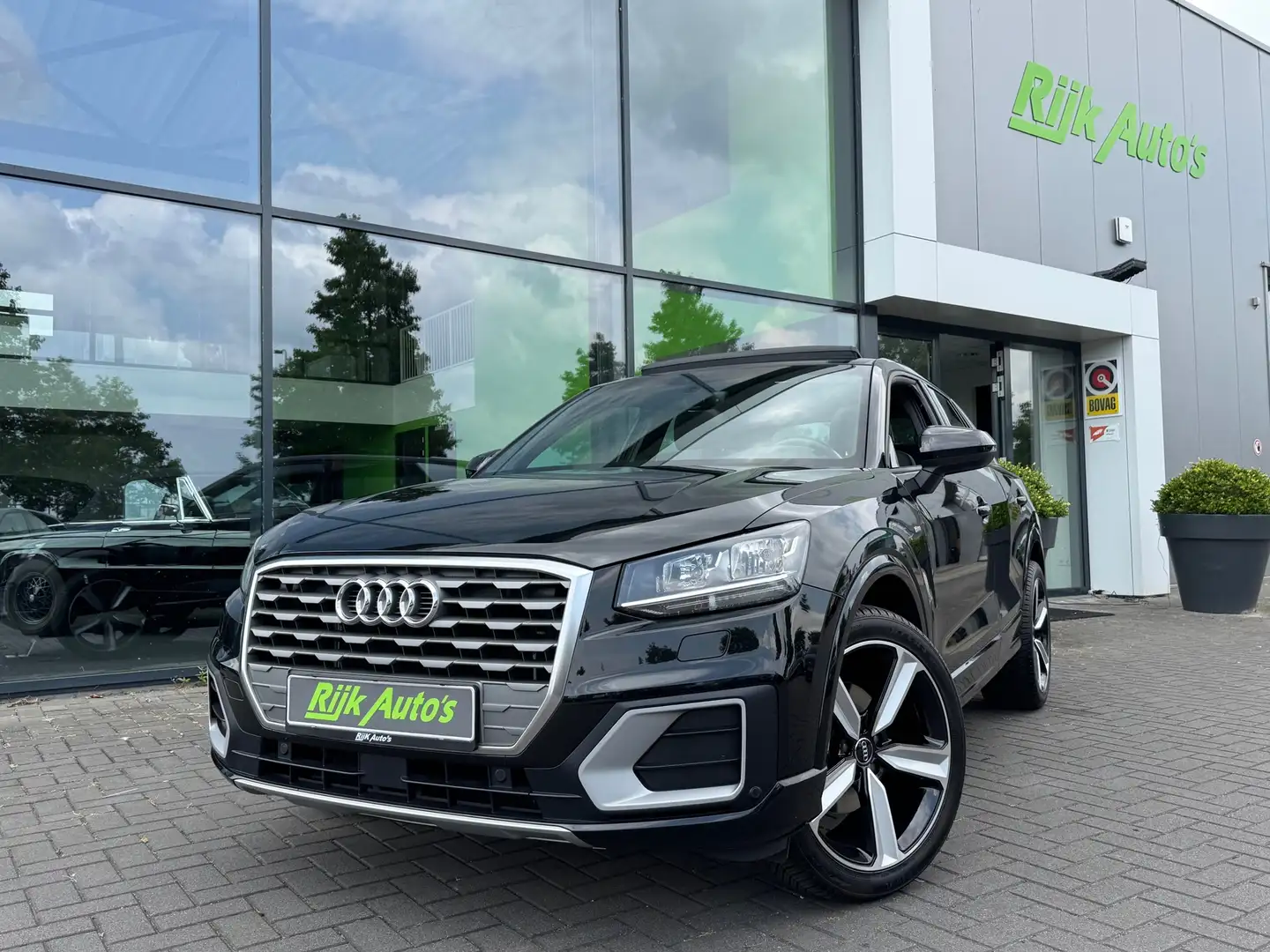 Audi Q2 1.4 TFSI CoD S-Line * Panoramadak * Trekhaak * 1E Zwart - 1