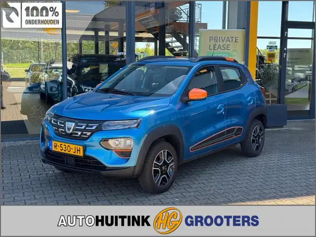 Dacia Spring Essential 27 kWh - camera - navi - leer