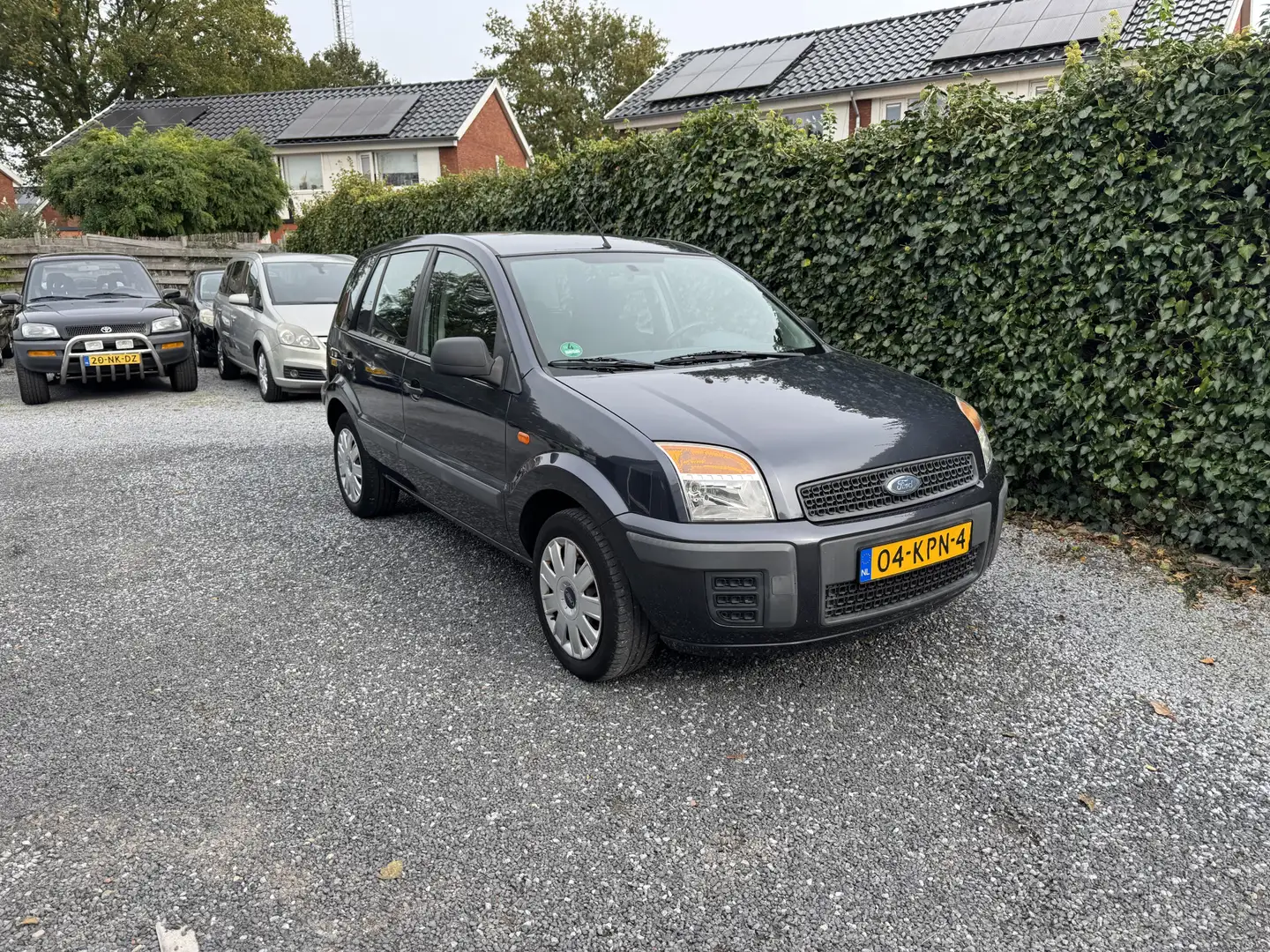 Ford Fusion 1.4-16V Cool & Sound | Airco | Elekt. Ramen | Trek Gris - 1