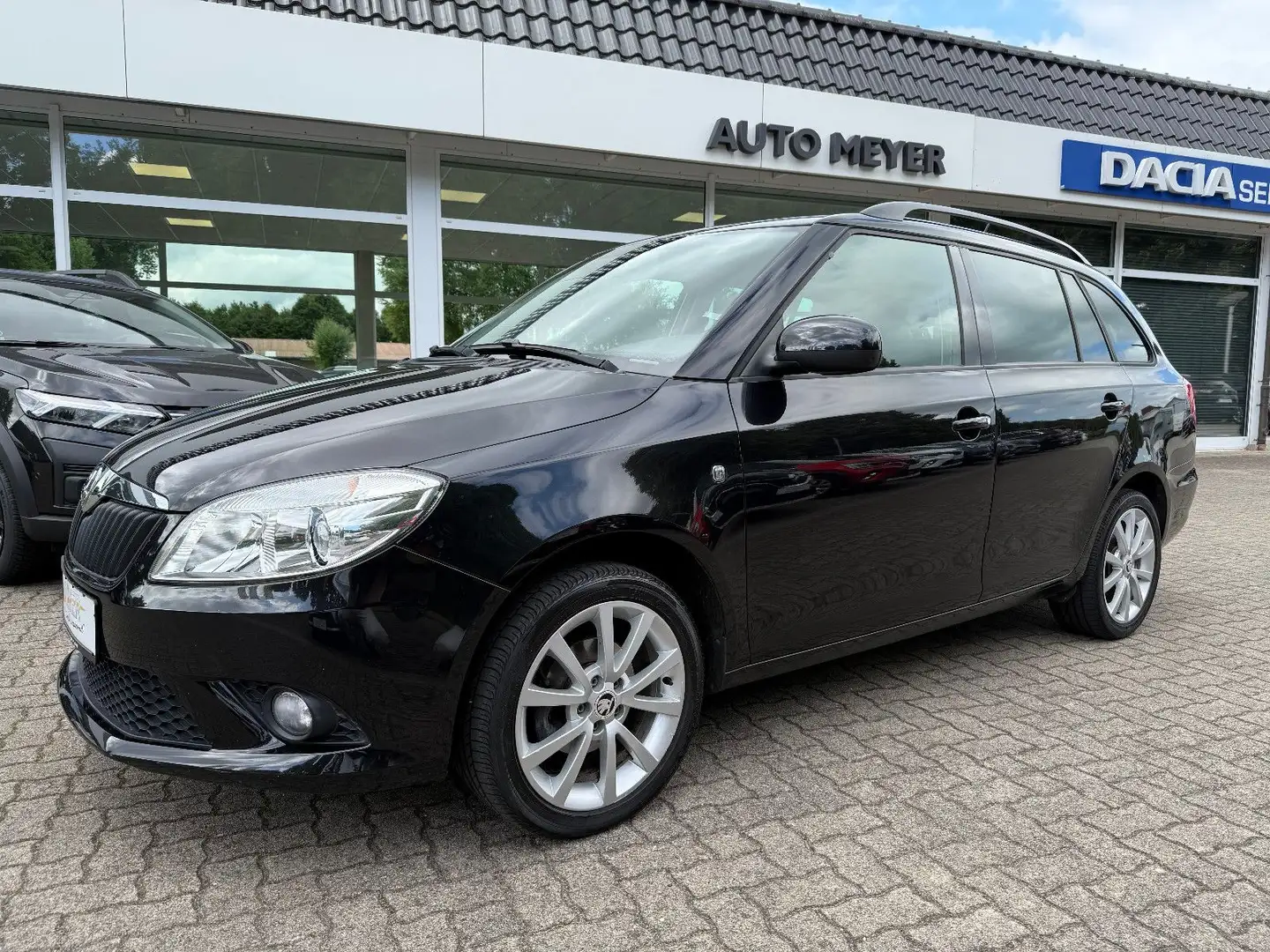Skoda Fabia Best of 1.4 Combi Klima/SHZ/WKR-SKR Schwarz - 1