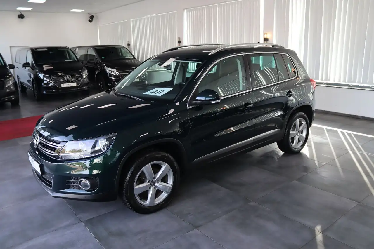 Volkswagen Tiguan Sport & Style 4Motion * 1.HAND * — photo 1 of 21