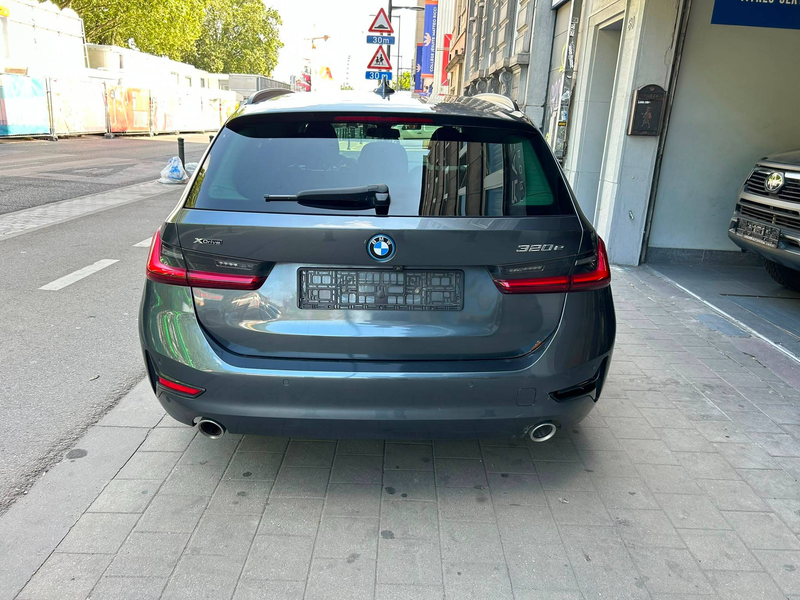 BMW 320 Touring 320eXA PHEV — photo 3
