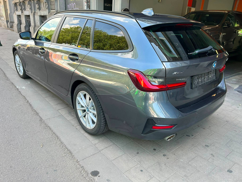BMW 320 Touring 320eXA PHEV — photo 12