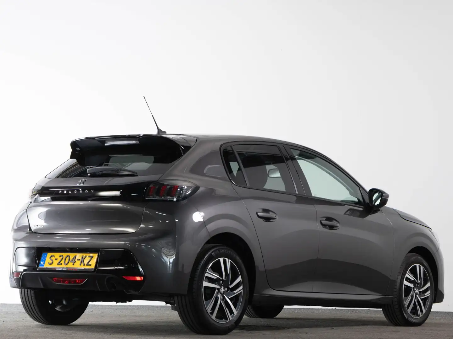 Peugeot 208 Allure Pack 1.2 PureTech 100pk EAT8 AUTOMAAT | Nav Gris - 2