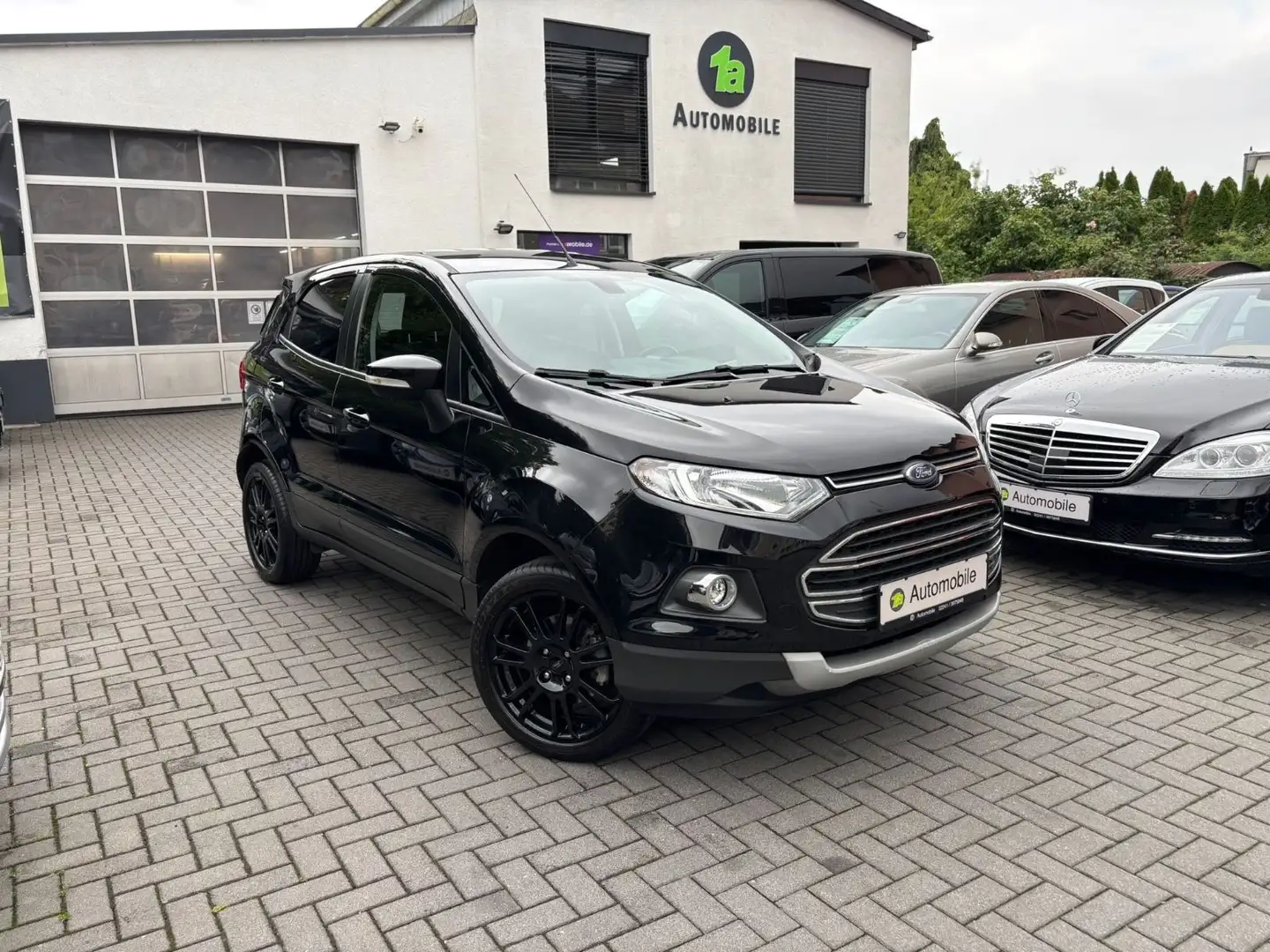 Ford EcoSport S*NAVI*PDC*KAM*KLIMAA.*1.HAND Schwarz - 1