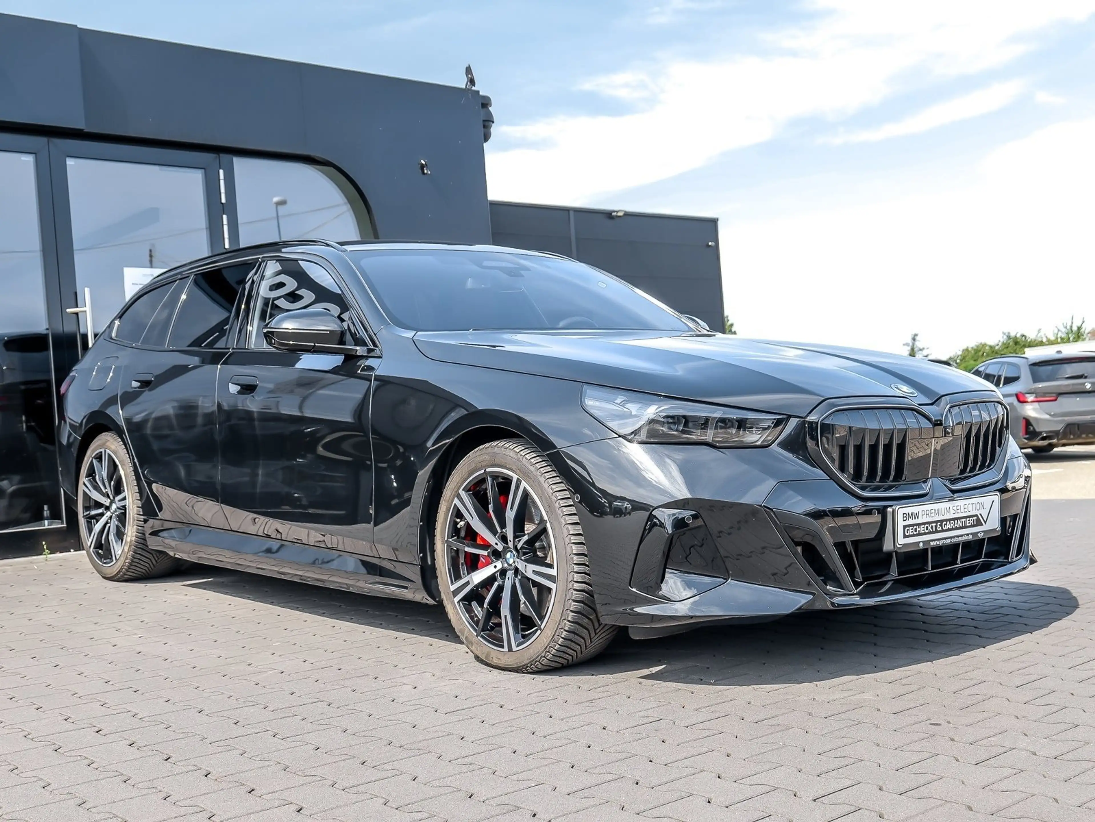 BMW 550 e xDrive Touring — photo 6