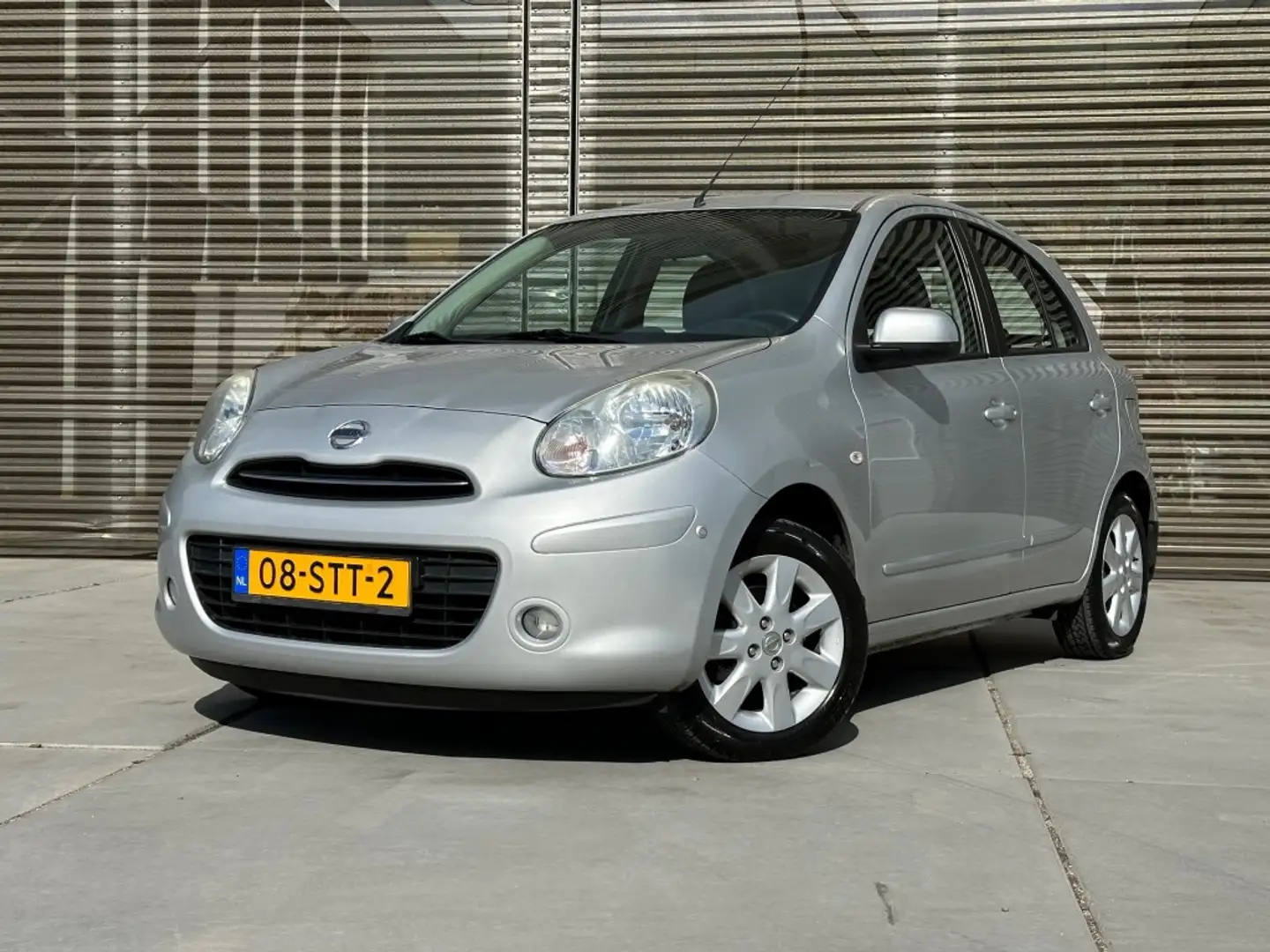 Nissan Micra 1.2 DIG-S CONNECT ED AIRCO/NAVI/LM VELGEN !! Grijs - 1
