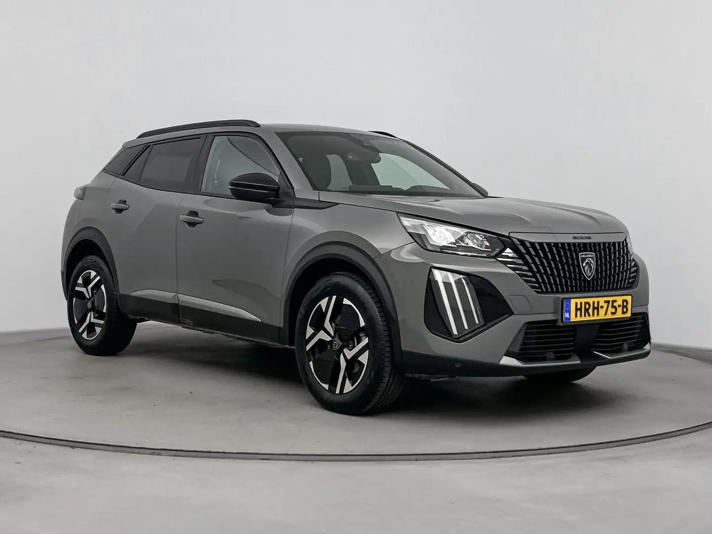 Peugeot 2008 1.2 Hybrid 136pk Allure | Navigatie | Lage km stan Gris - 2