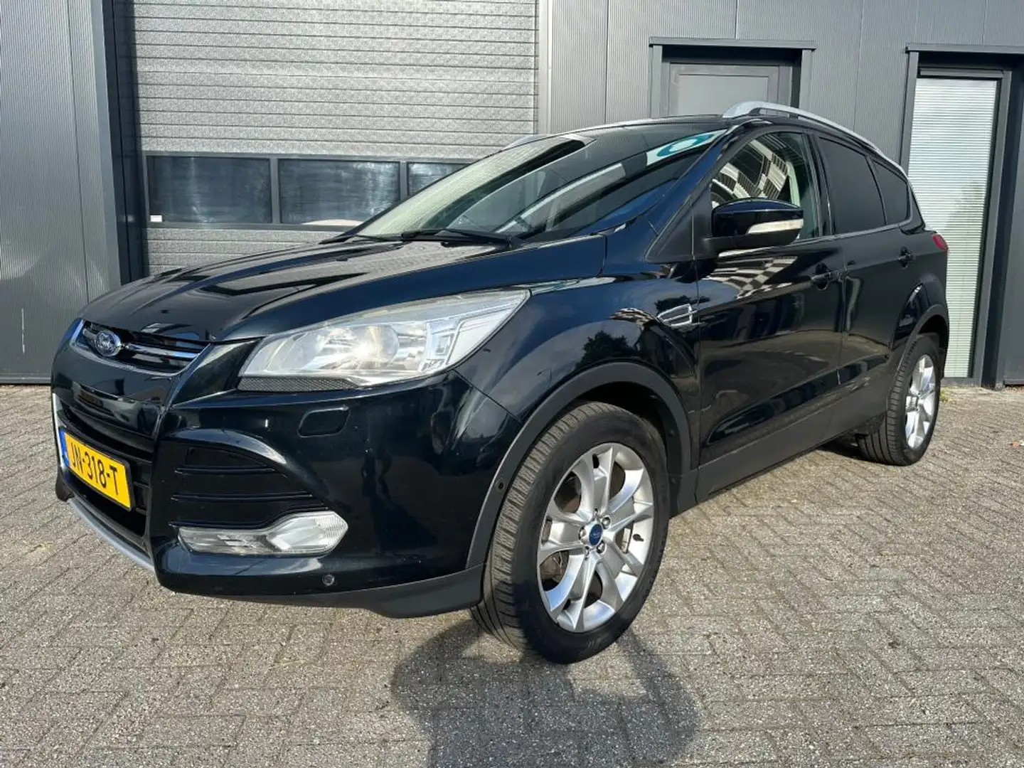 Ford Kuga 1.6 Titanium, Leer, Cruise, Clima, Trekhaak, Stoel Zwart - 1