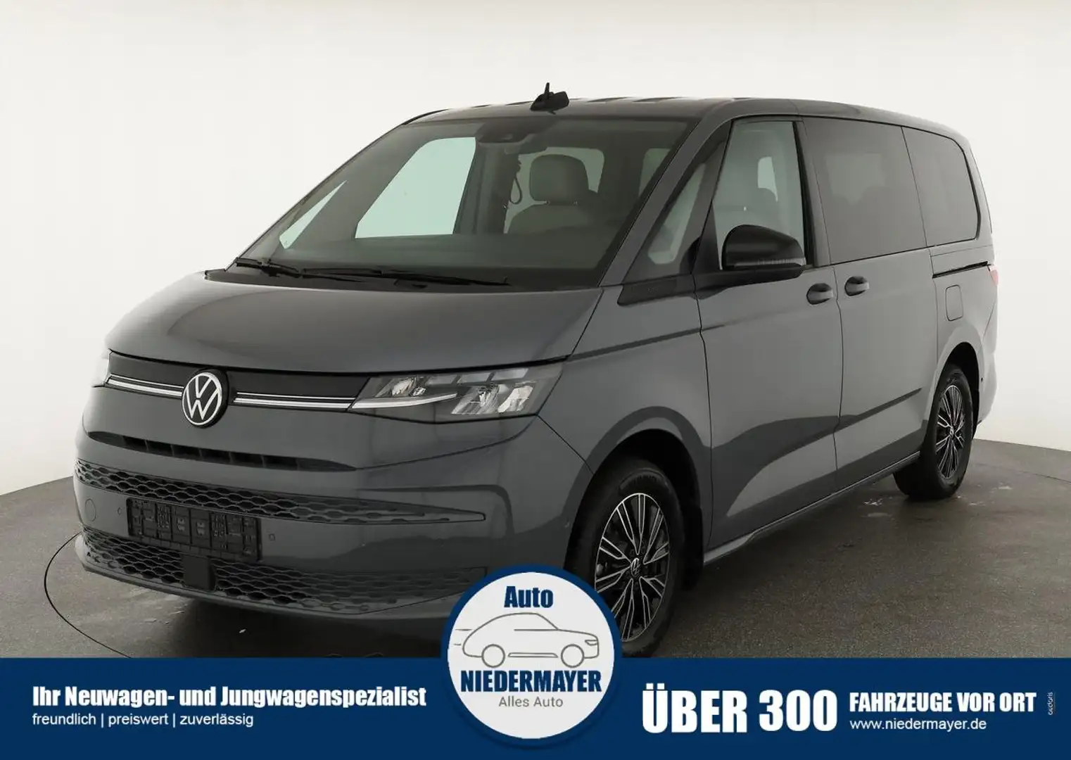 Volkswagen T7 Multivan TDI DSG lang Life, Teilleder, AHK, Navi, easyOpen, Grau - 1