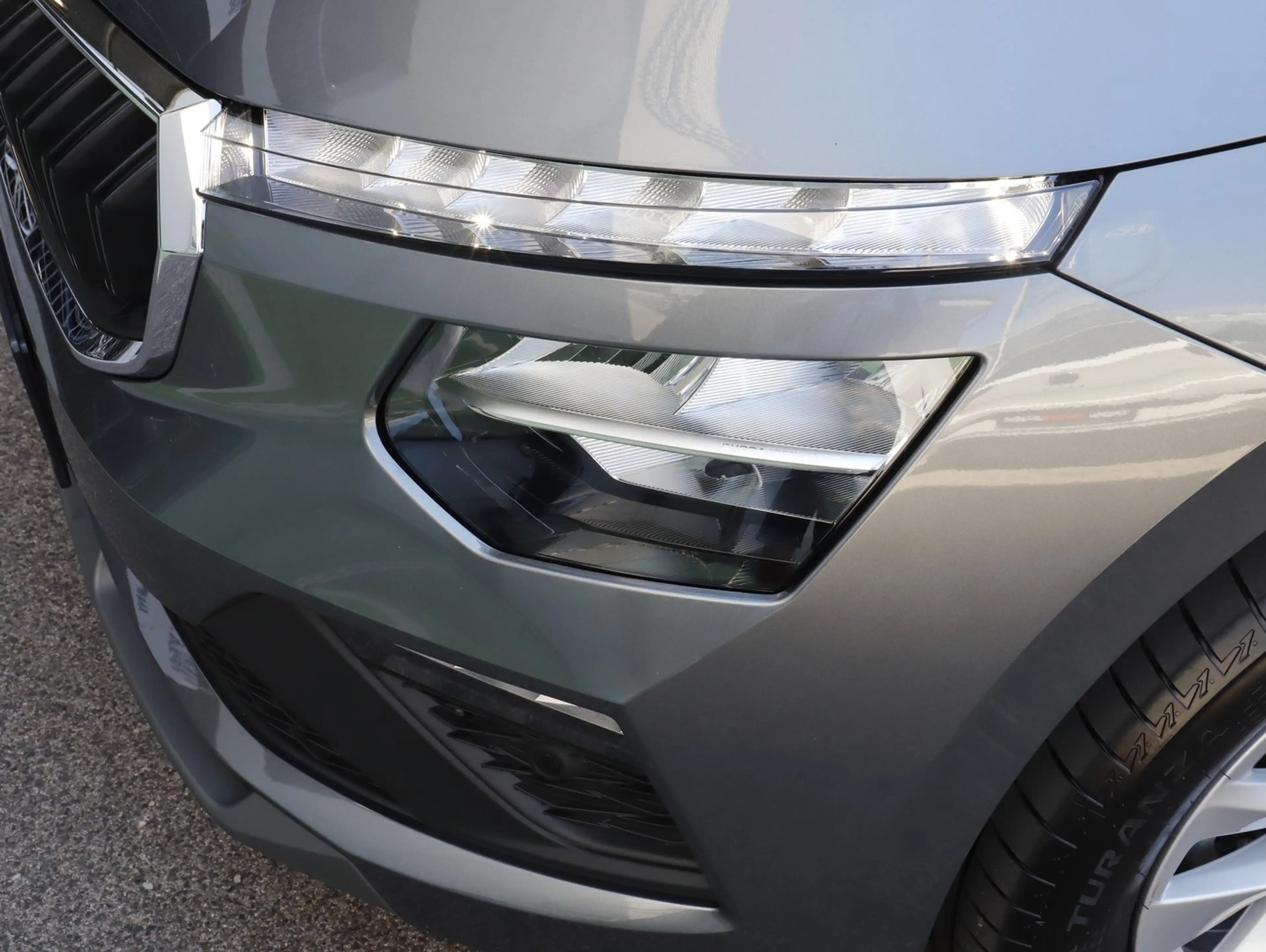Skoda Kamiq Selection TSI DSG — photo 7