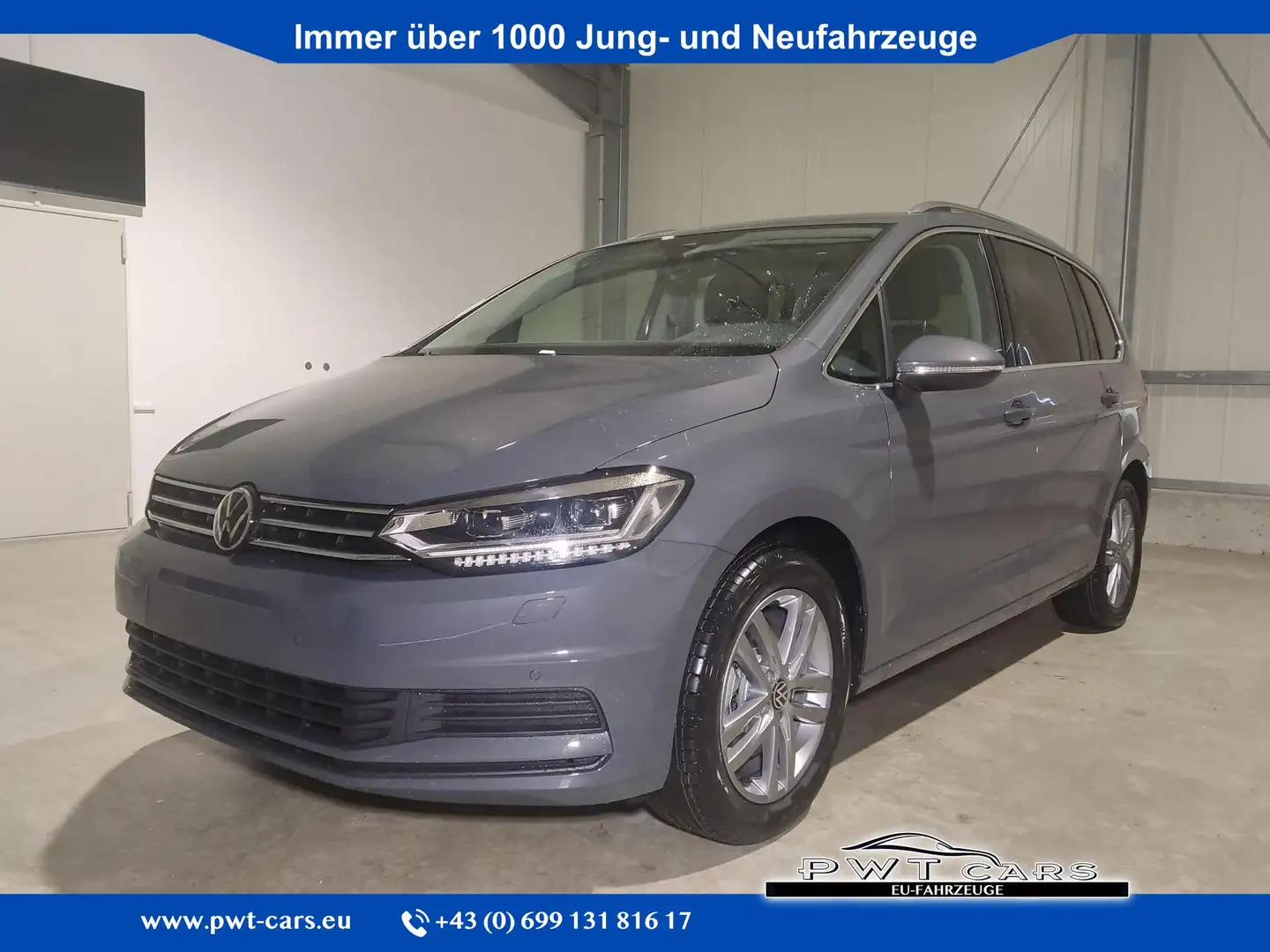 Volkswagen Touran Comfortline 1.5 TSI 150 PS DSG 7-Sitzer-AHK-Nav... Grau - 1