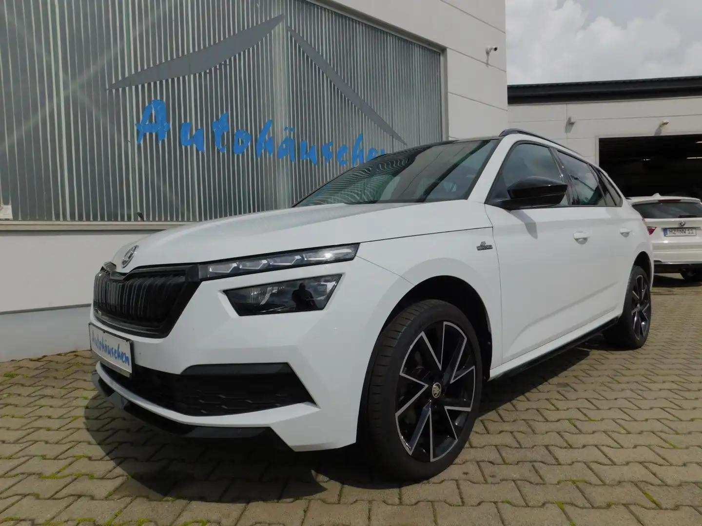 Skoda Kamiq 1.0 TSI Monte Carlo Sound/LED/NAVI/Panoram Weiß - 1