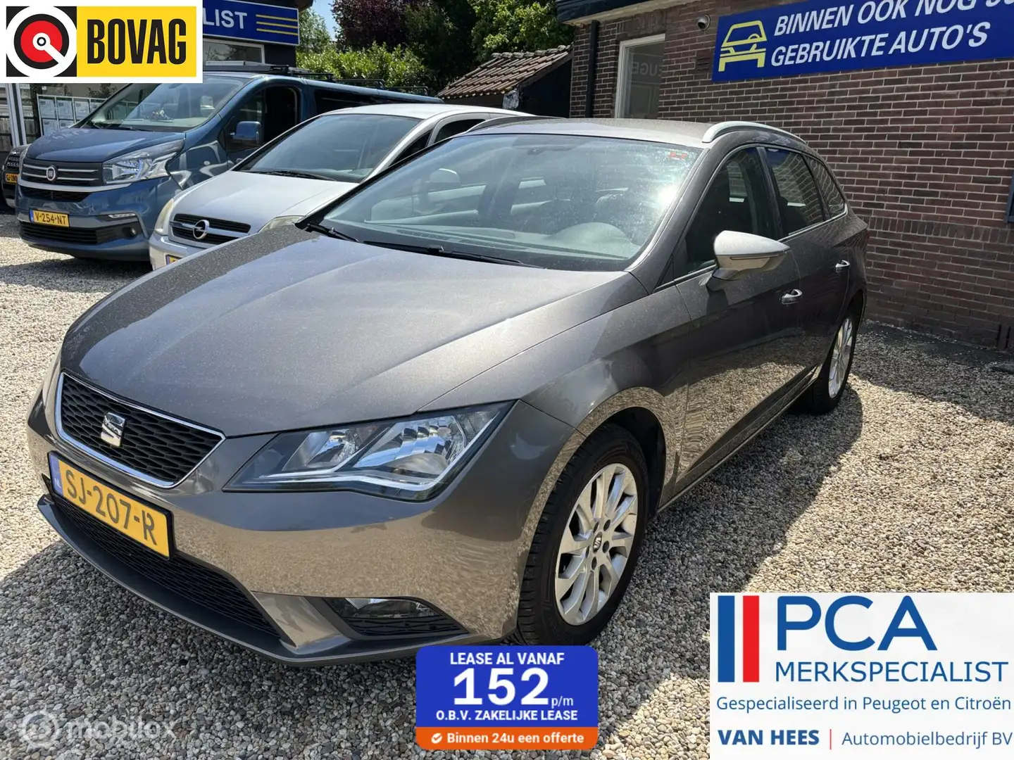 SEAT Leon ST 1.4 TSI Style met navigatie en climate control Grijs - 1