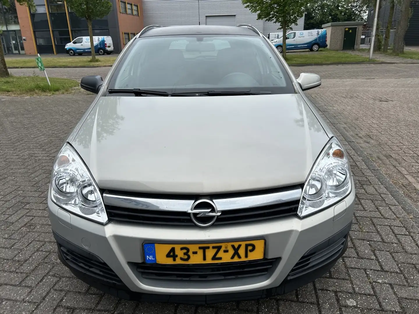 Opel Astra Wagon 1.6 Business 105PK 1e EIG AIRCO TRHK NAP! Grijs - 2