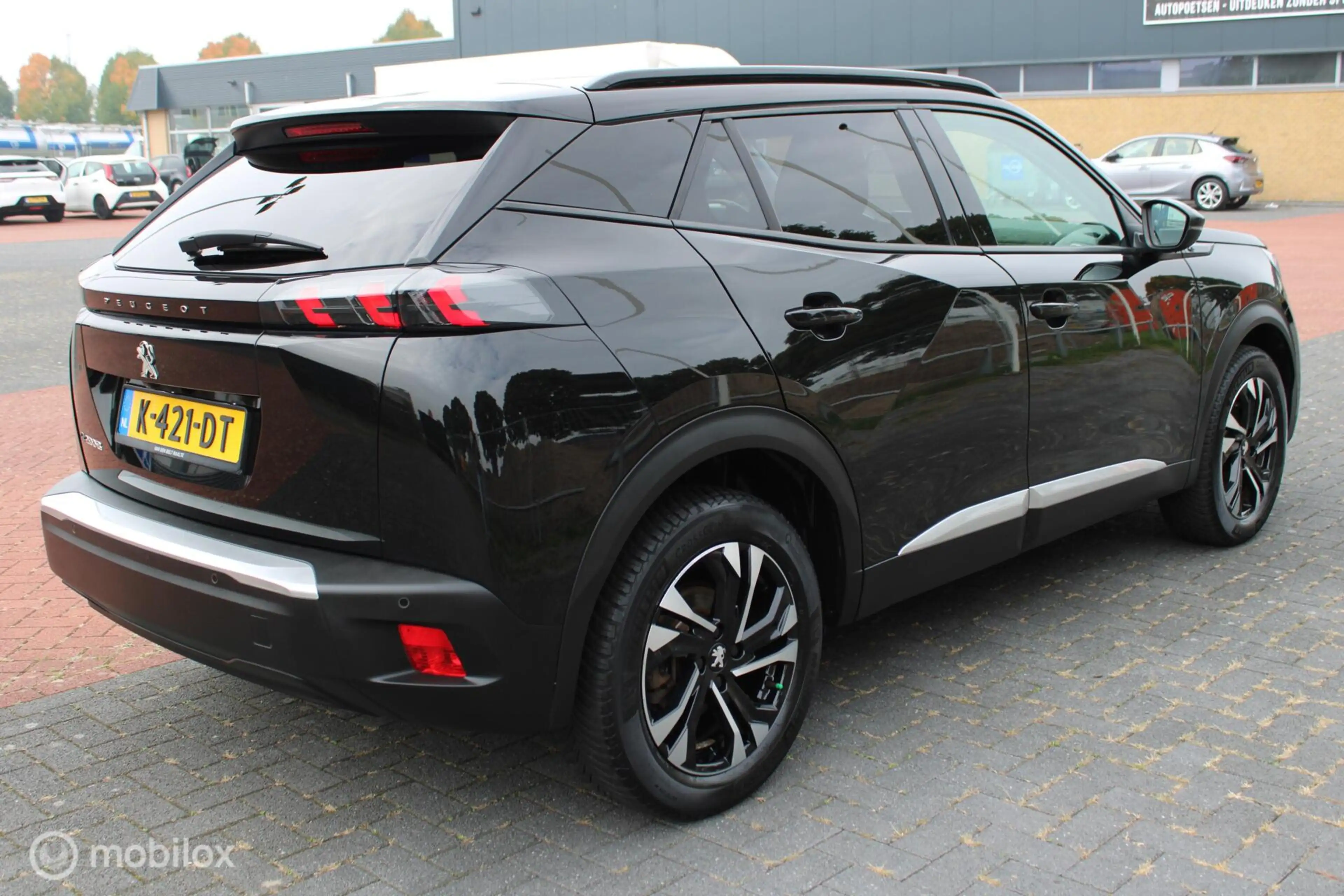 Peugeot e-2008 EV Allure 50 kWh, Navi, App connect, Cruise, Clima — photo 7