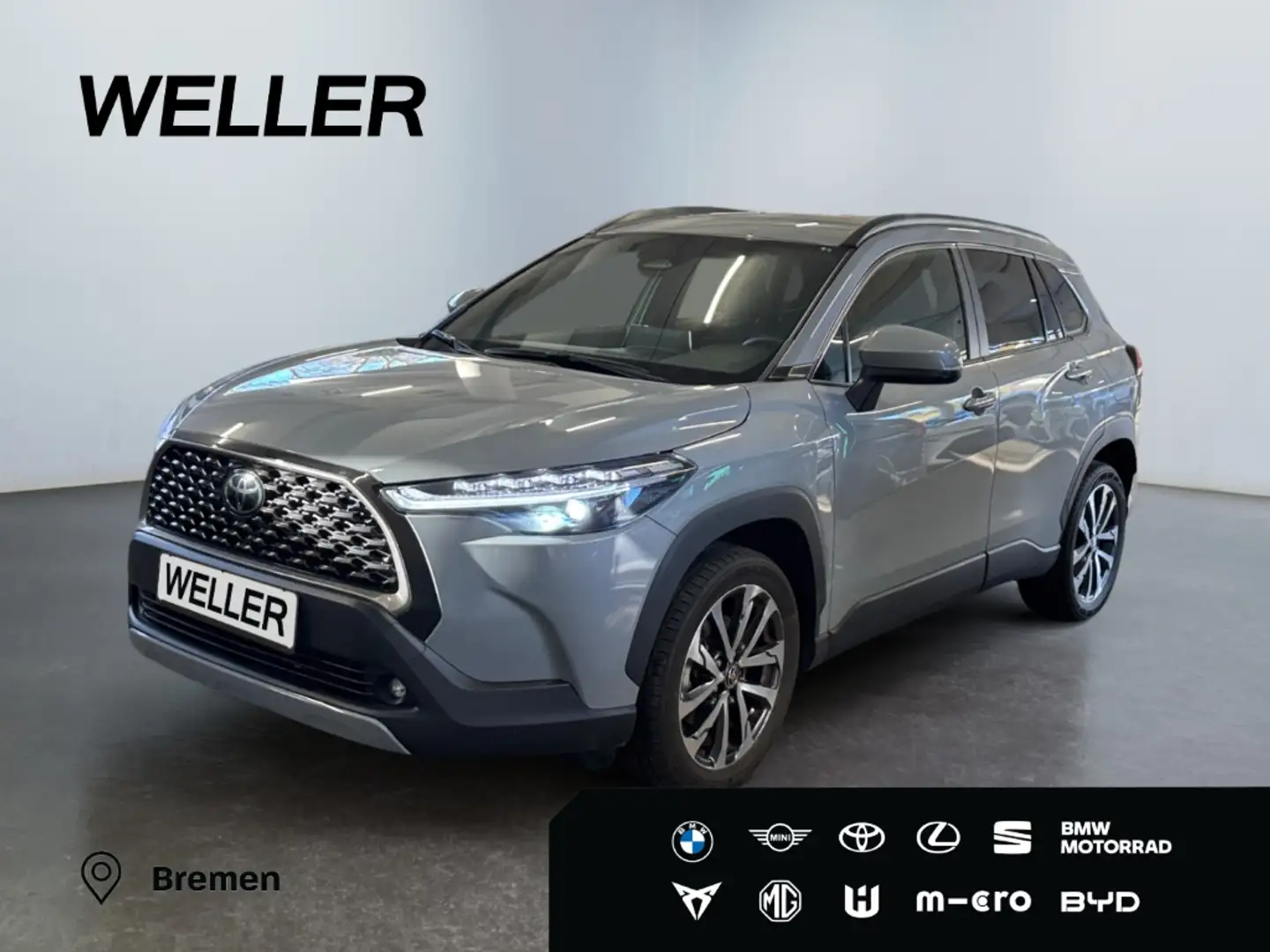 Toyota Corolla Cross Hybrid 1.8 Team D *LED*ACC*CAM*PDC* Grijs - 1