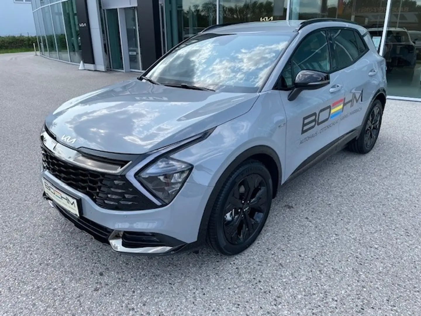 Kia Sportage 1,6 TGDI 48V Anniversary AWD DCT Grau - 1