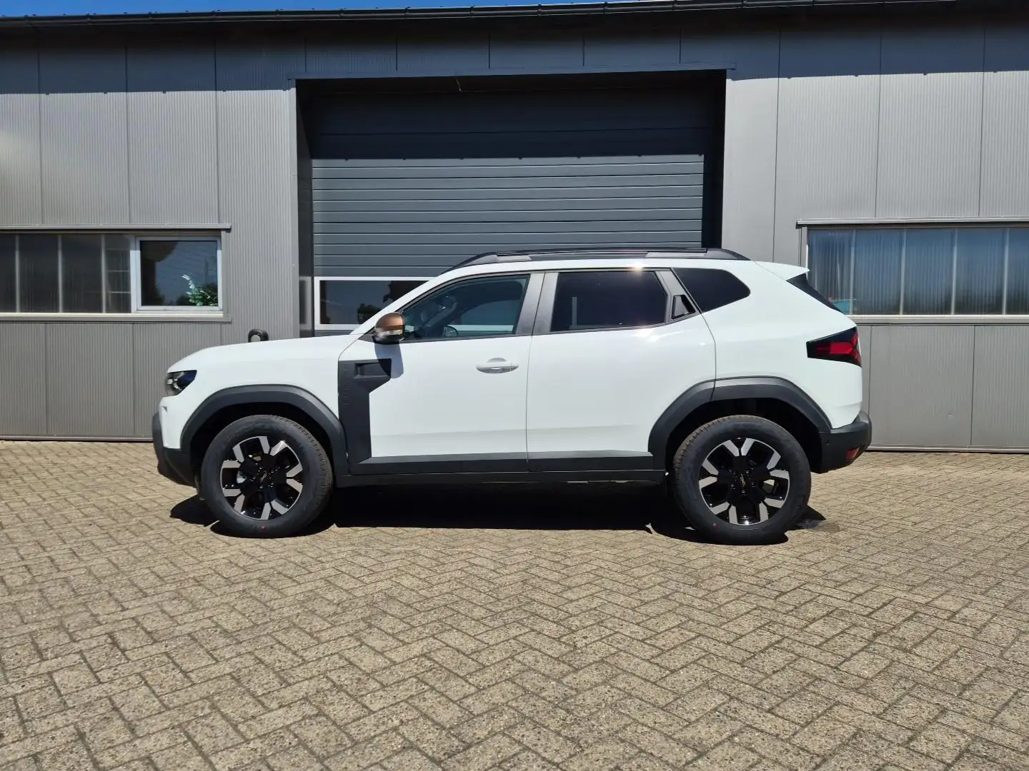 Dacia Duster Extreme Hybrid 140PS Automatik 1.6 SCE Lenkradh... Weiß - 2
