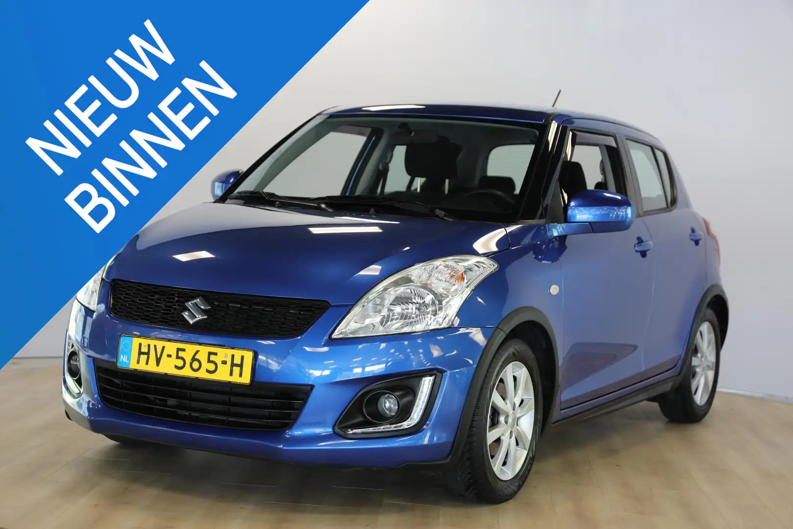 Suzuki Swift 1.2 Dynamic EASSS | Cruise | Navi | Airco Blauw - 1