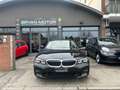 BMW 320 320d 48V xDrive Touring Business Advantage Zwart - thumbnail 6