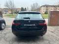 BMW 320 320d 48V xDrive Touring Business Advantage Zwart - thumbnail 2