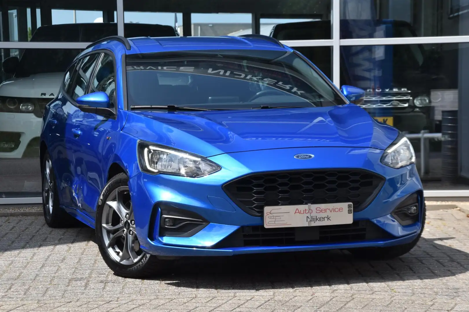 Ford Focus Wagon 1.0 EcoBoost ST Line Business Airco Navi. Ca Blauw - 1