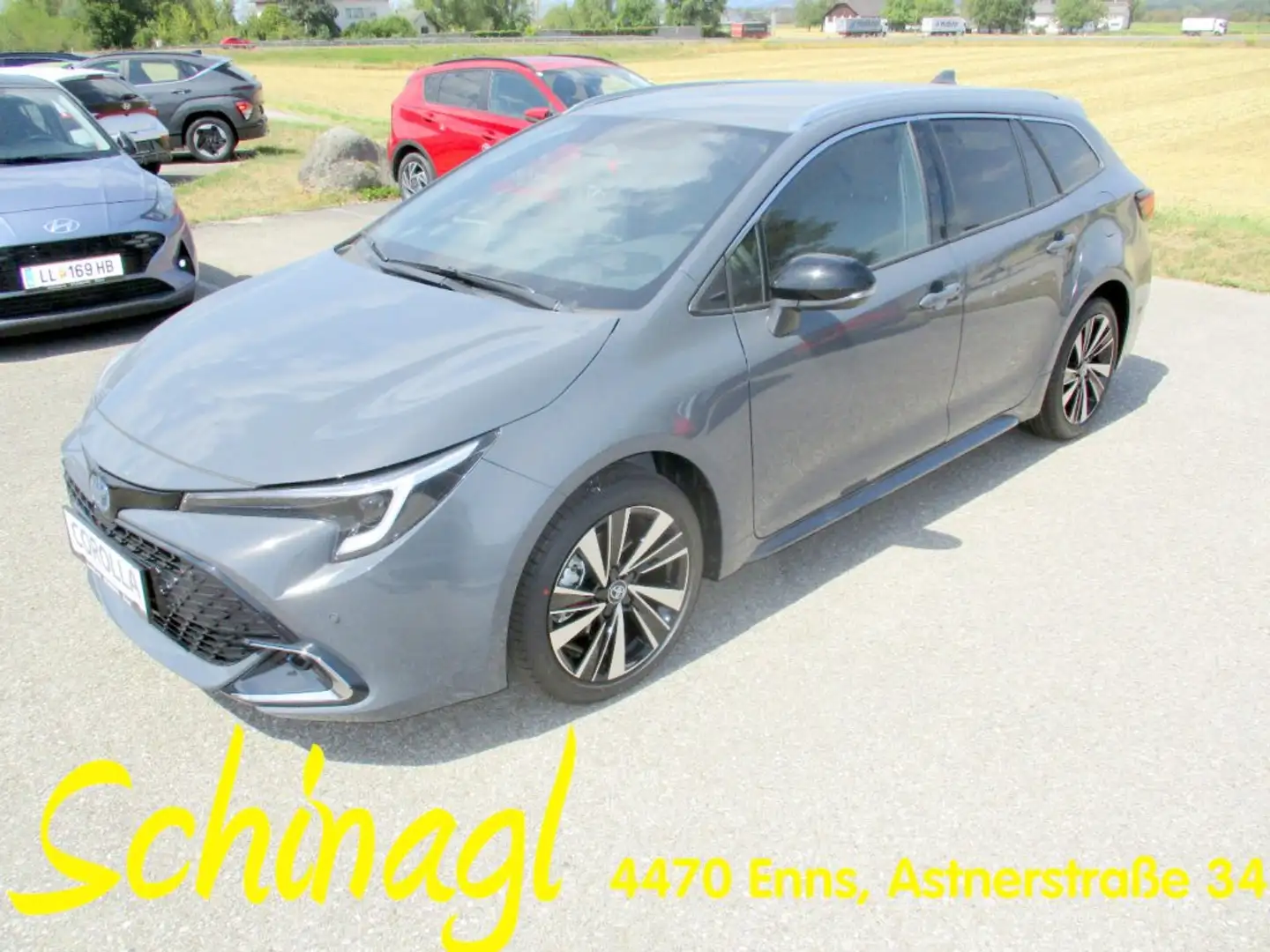 Toyota Corolla TS 1,8 HEV Teamplayer Grau - 1