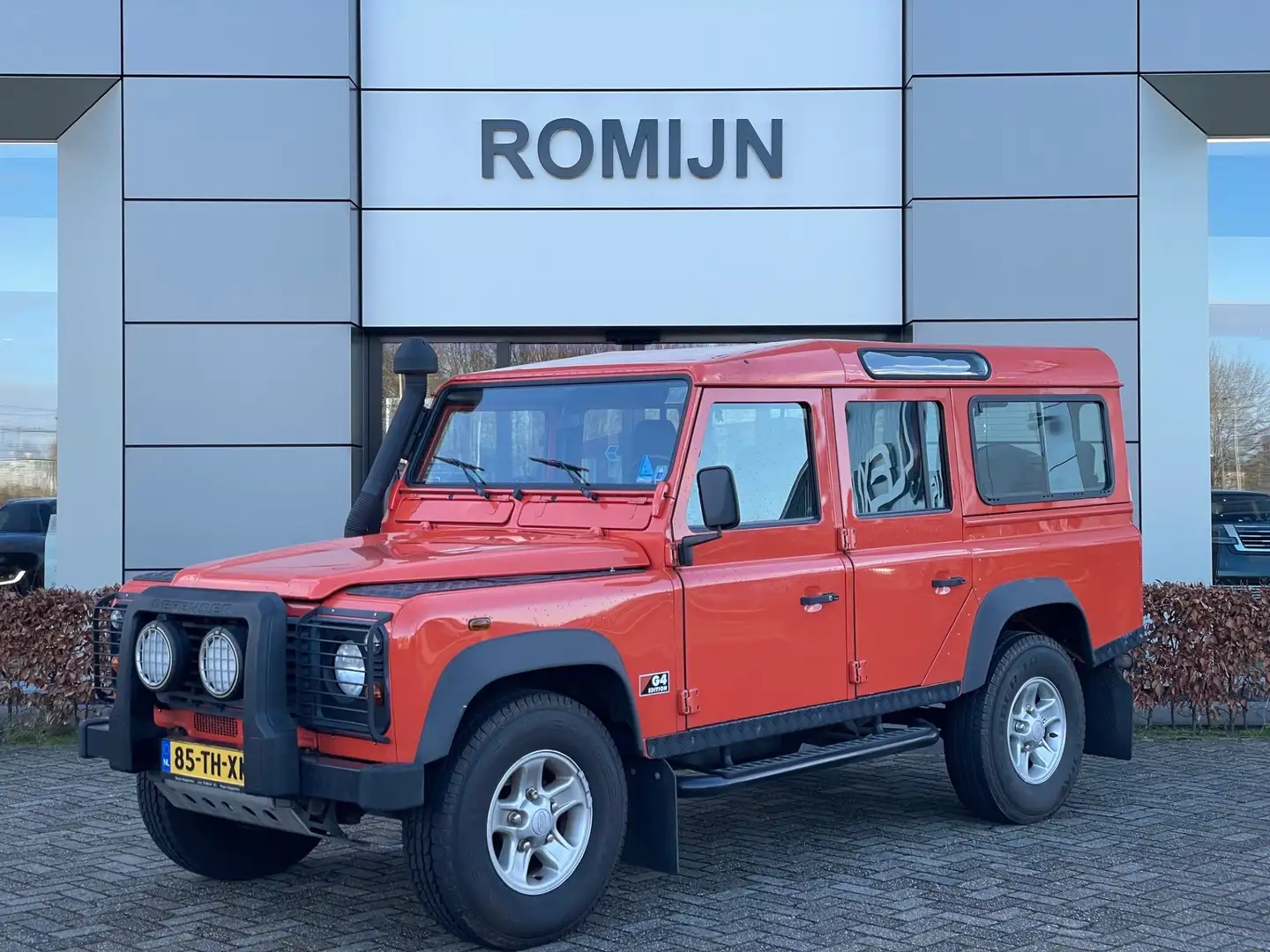 Land Rover Defender 2.5 TD5 110 G4 Edition 9-persoons Orange - 1