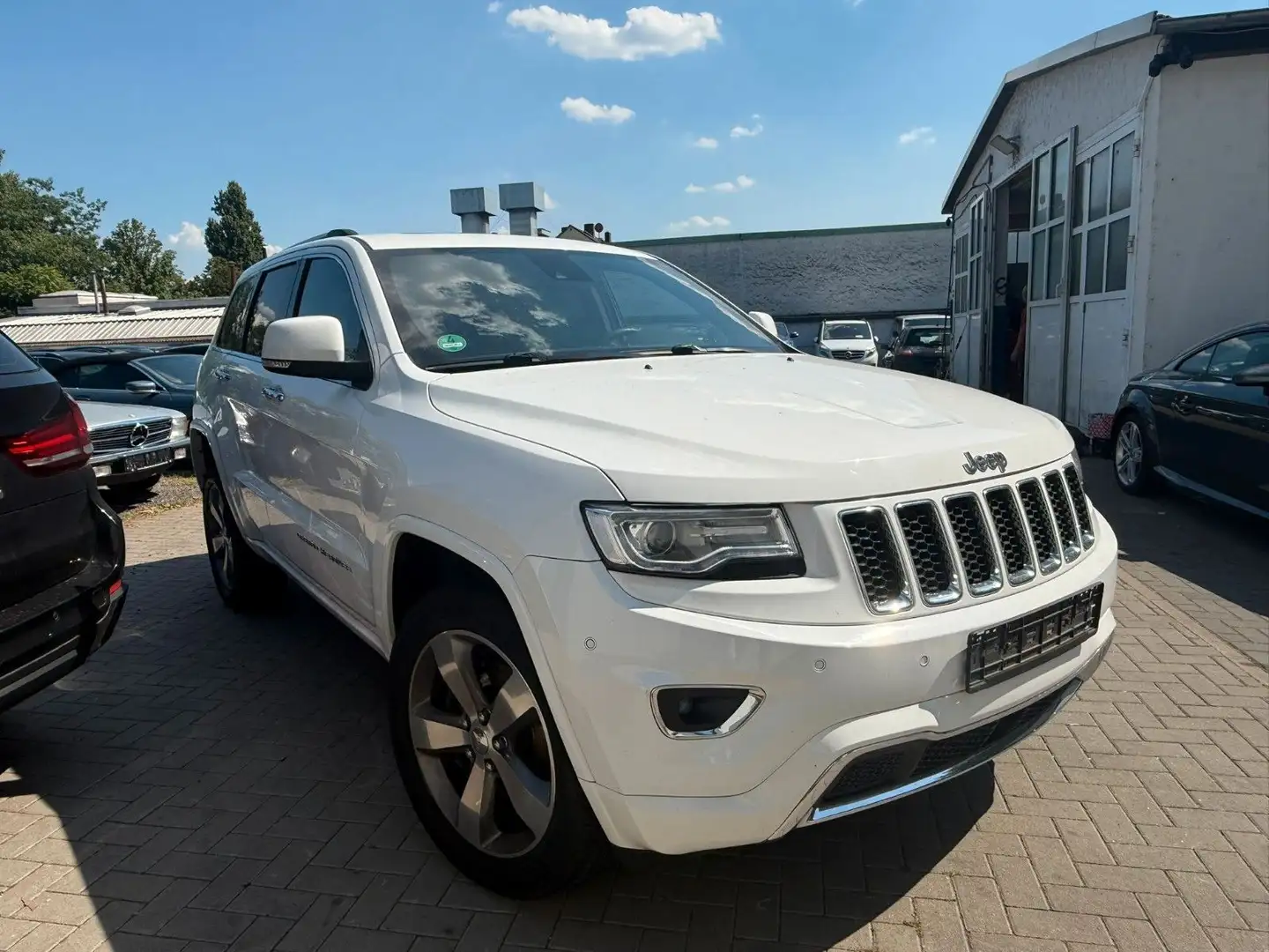 Jeep Grand Cherokee 3.0 CRD Overland MOTORSCHADEN White - 1