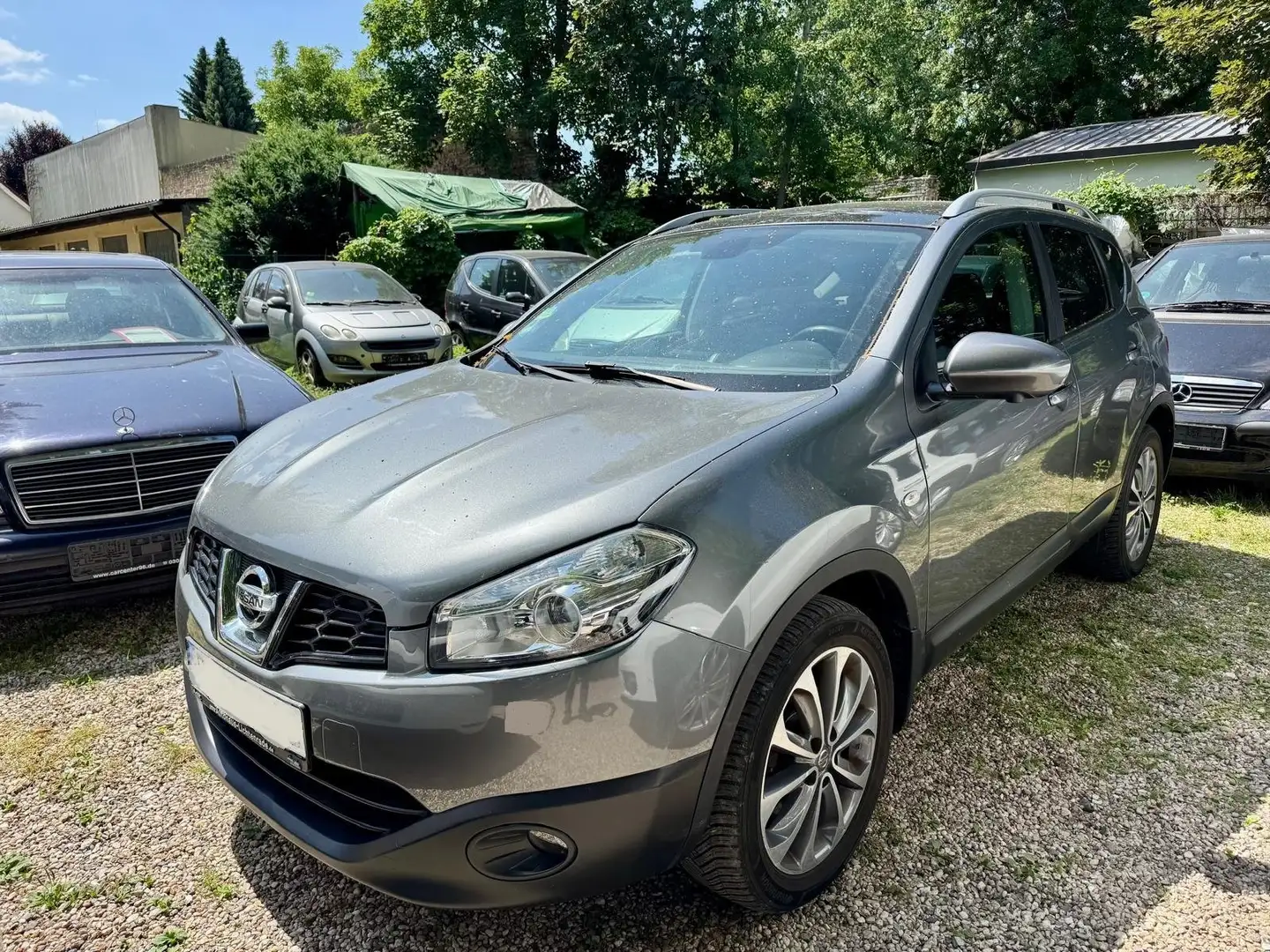 Nissan Qashqai 4X4 Navi Leder Klima Glasdach Alu Euro5 Automatik Grijs - 1