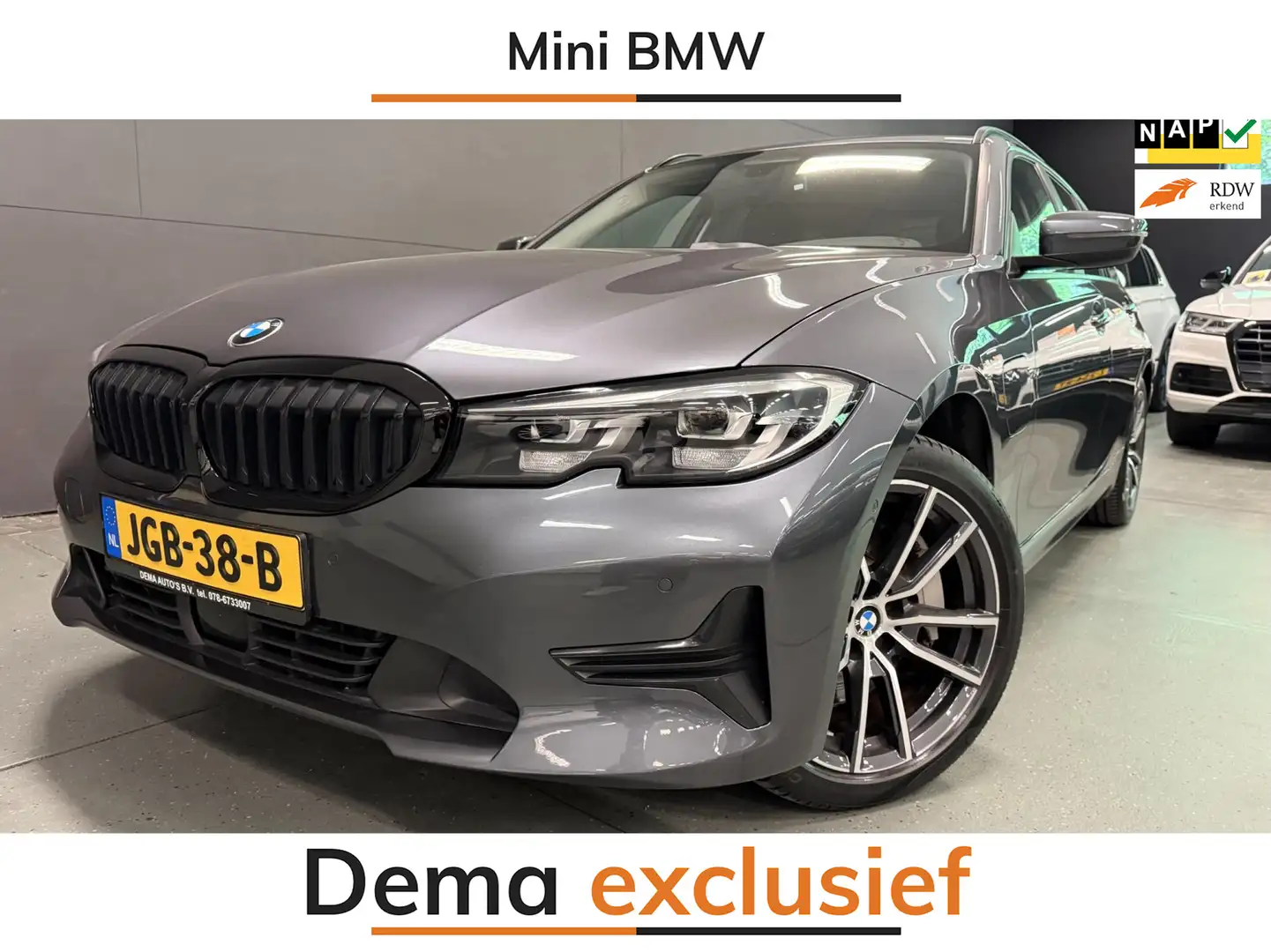 BMW 330 3-serie Touring 330e High Executive V-COCKPIT/NAVI Grijs - 1