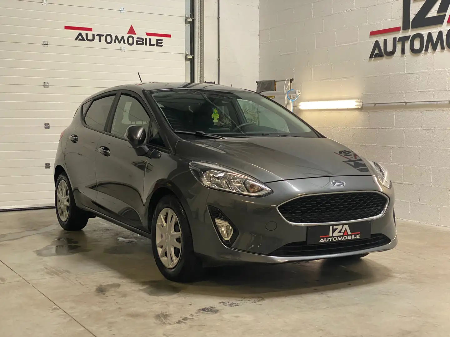 Ford Fiesta 1.1i / Navigation / Garantie 12 Mois / Gris - 1