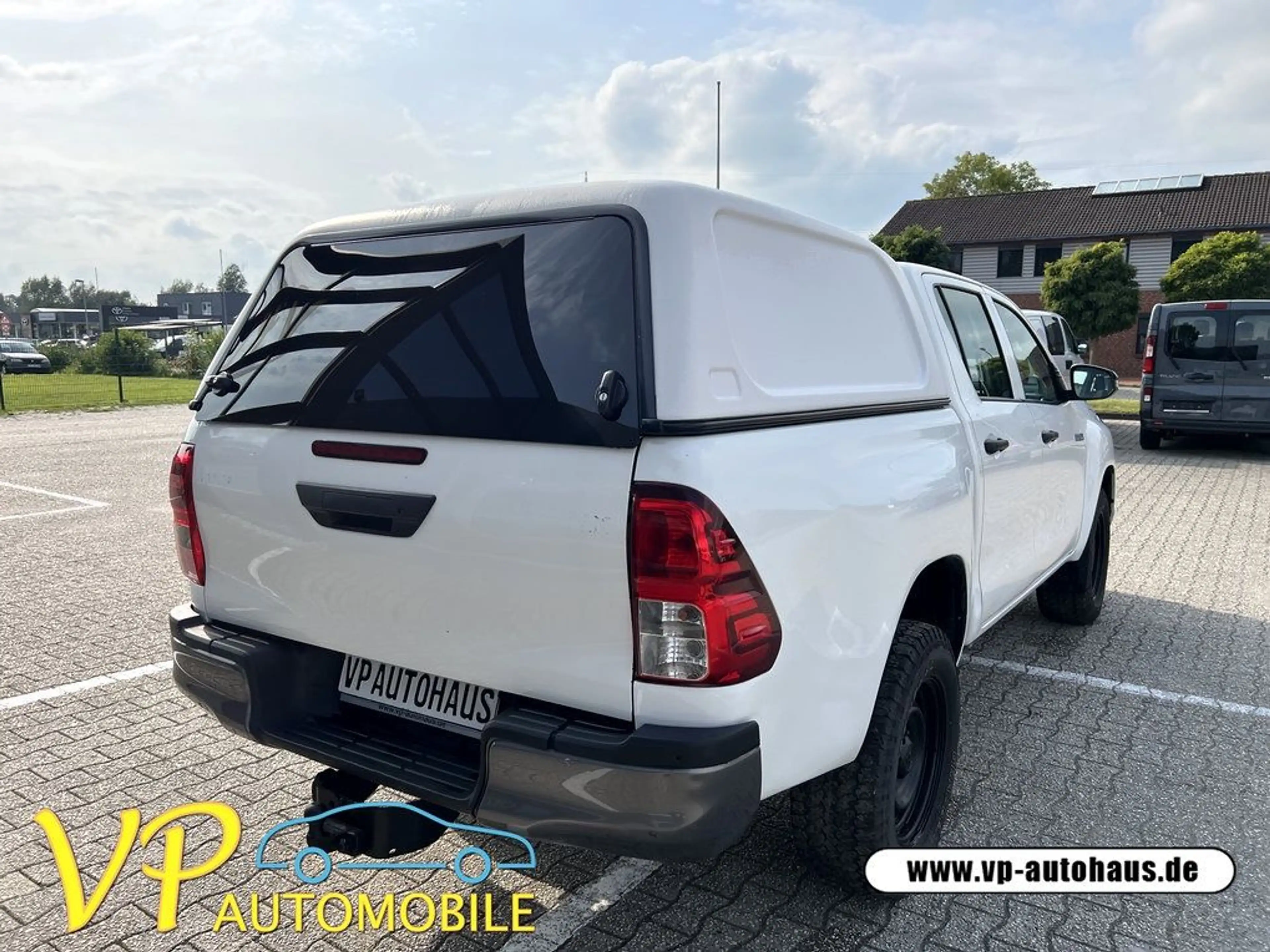 Toyota Hilux Double Cab Duty 4x4 AHK Hardtop — photo 7