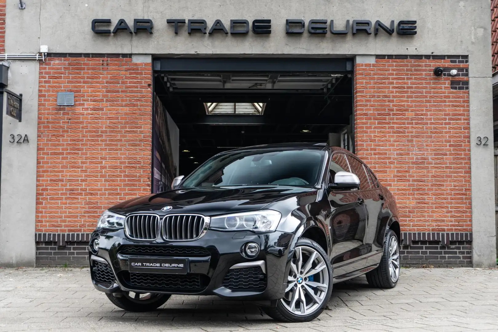 BMW X4 M40i High Executive M-Sport Pano / Camera / Memory Zwart - 1