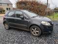 Suzuki SX4 1.6i Essence | 107 CH Noir - thumbnail 1