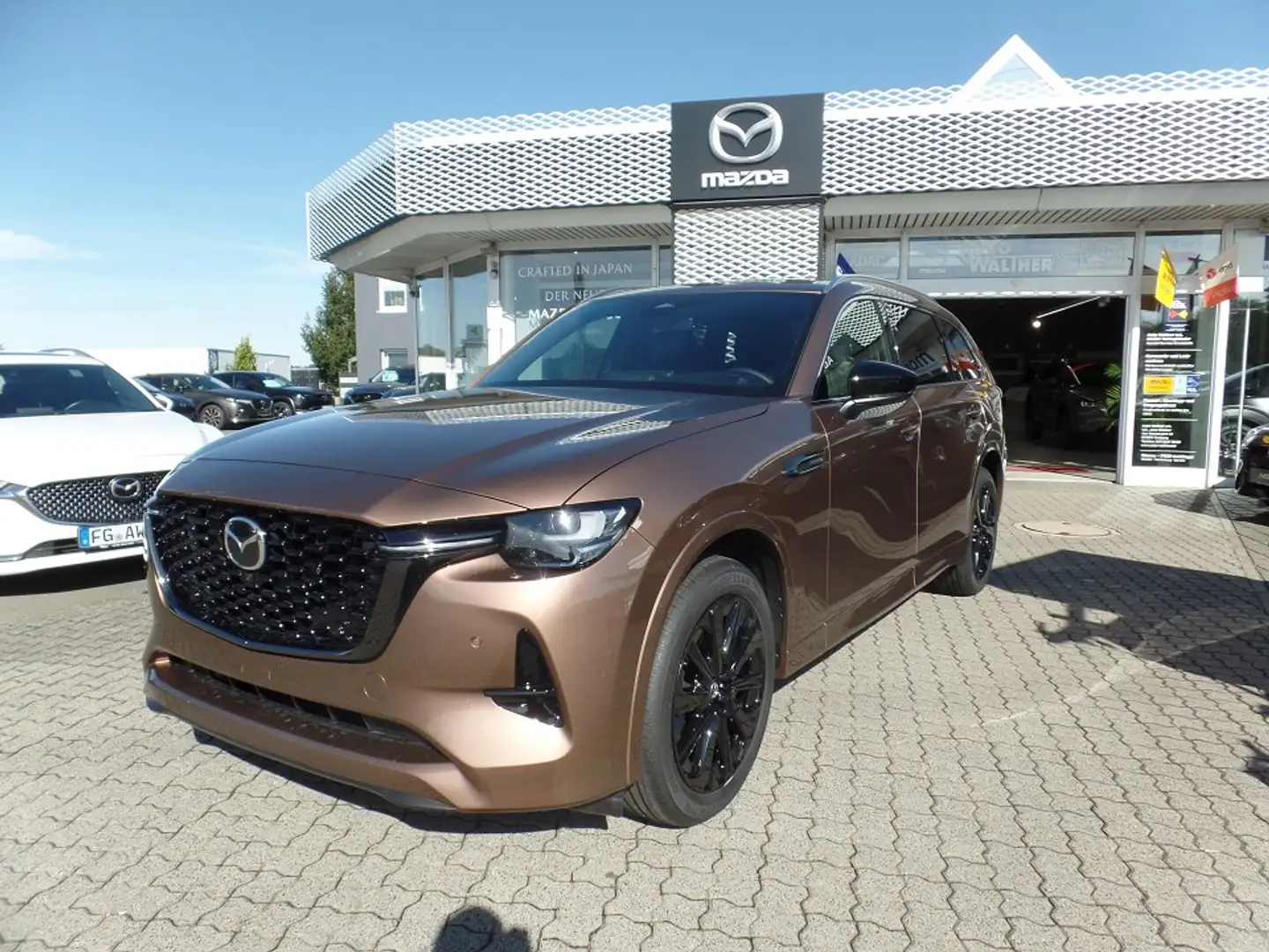 Mazda CX-80 5WGN 3.3L e-SKYACTIV D 254ps 8AT AWD Homura Plus Коричневий - 1