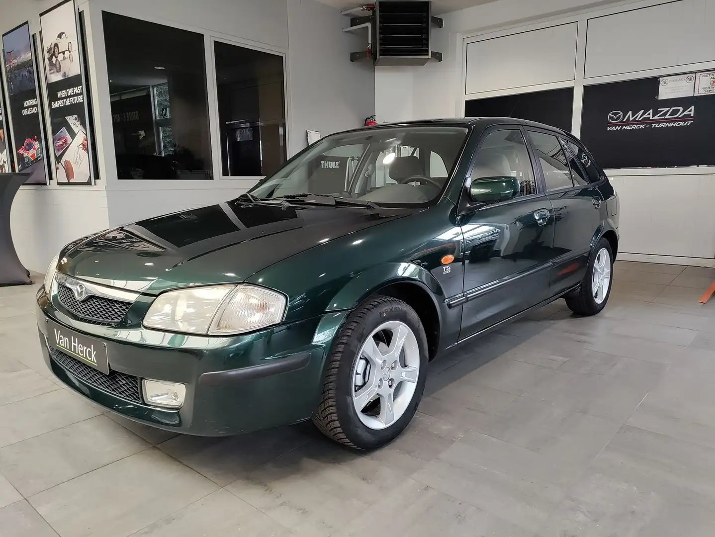 Mazda 323 1.5i TSI automaat Vert - 1