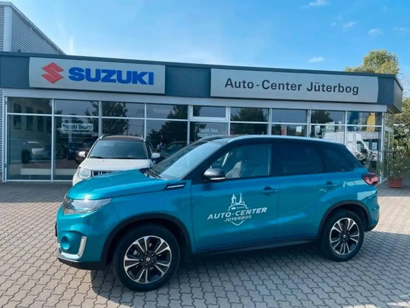 Suzuki Vitara 1.5 Comfort+ 4x4 *Allgrip*Panorama Blauw - 1