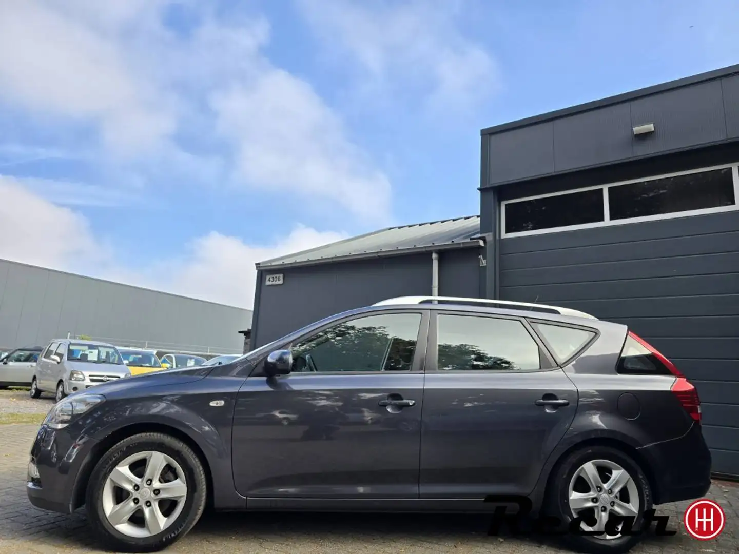 Kia Ceed / cee'd Sporty Wagon - 1.4 CVVT Navigator Plus Pack/Navi/P Grijs - 2