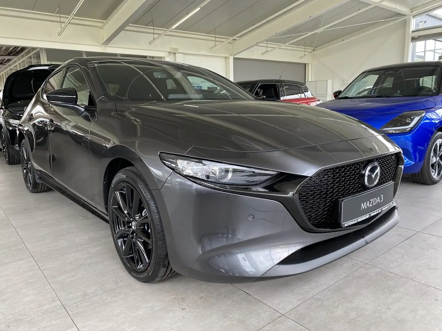 Mazda 3 2.0 X Homura AUTOMATIK PDC, Log-in, Head-up, Kamer Grau - 1
